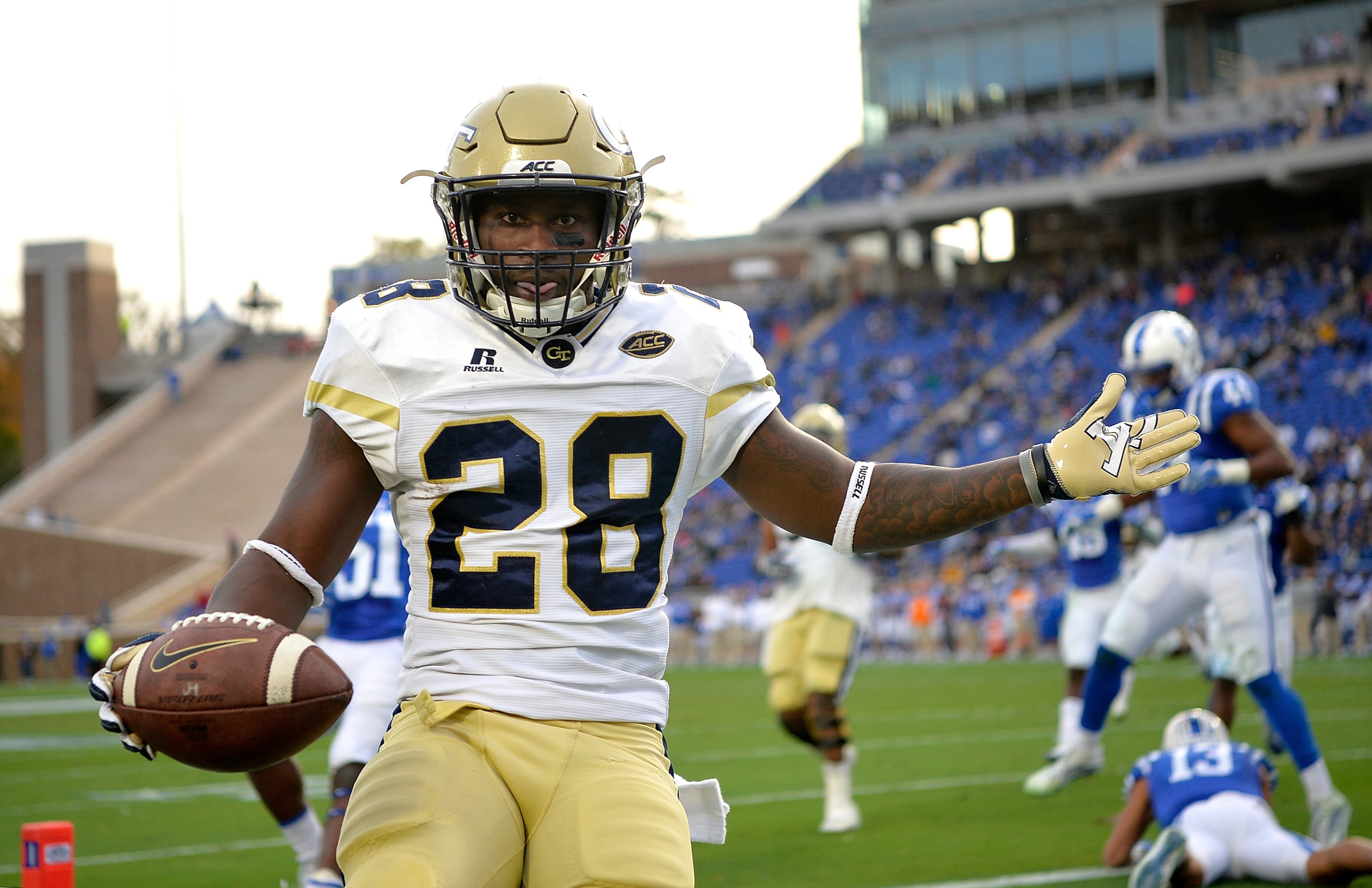 DURHAM, NC - NOVEMBER 18: J.J. Green #28 of the Georgia Tech Yellow Jackets reacts after scoring a touchdown against the Duke Blue Devils during their game at Wallace Wade Stadium on November 18, 2017 in Durham, North Carolina. (Photo by Grant Halverson/Getty Images)