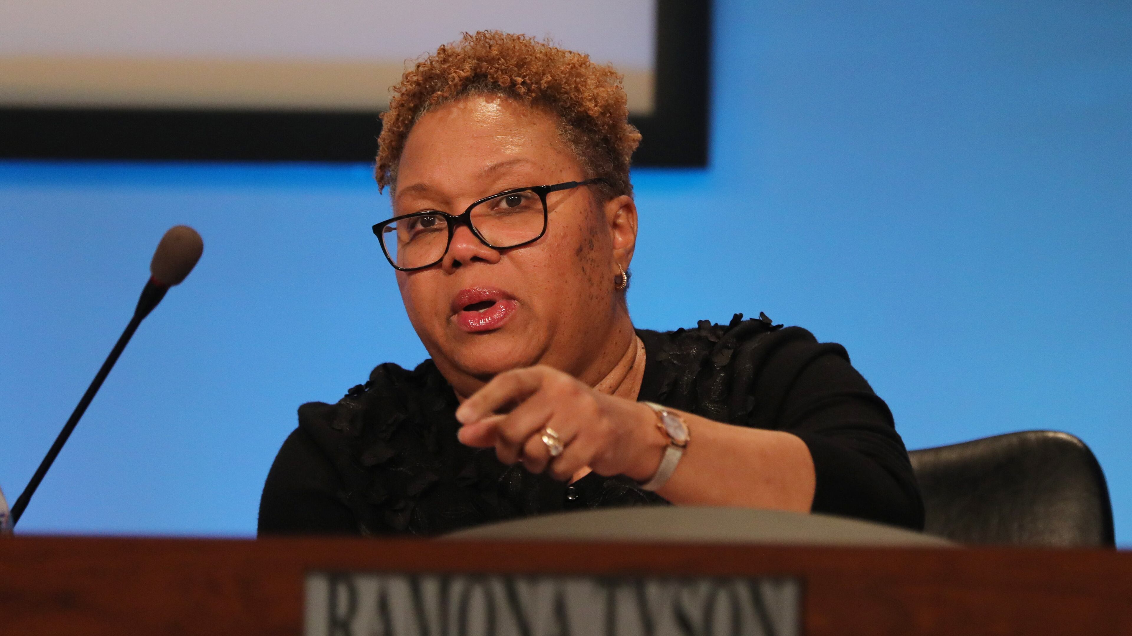 Superintendent Ramona Tyson, points to a speaker during a public meeting in February at the DeKalb County School District's headquarters in Stone Mountain.