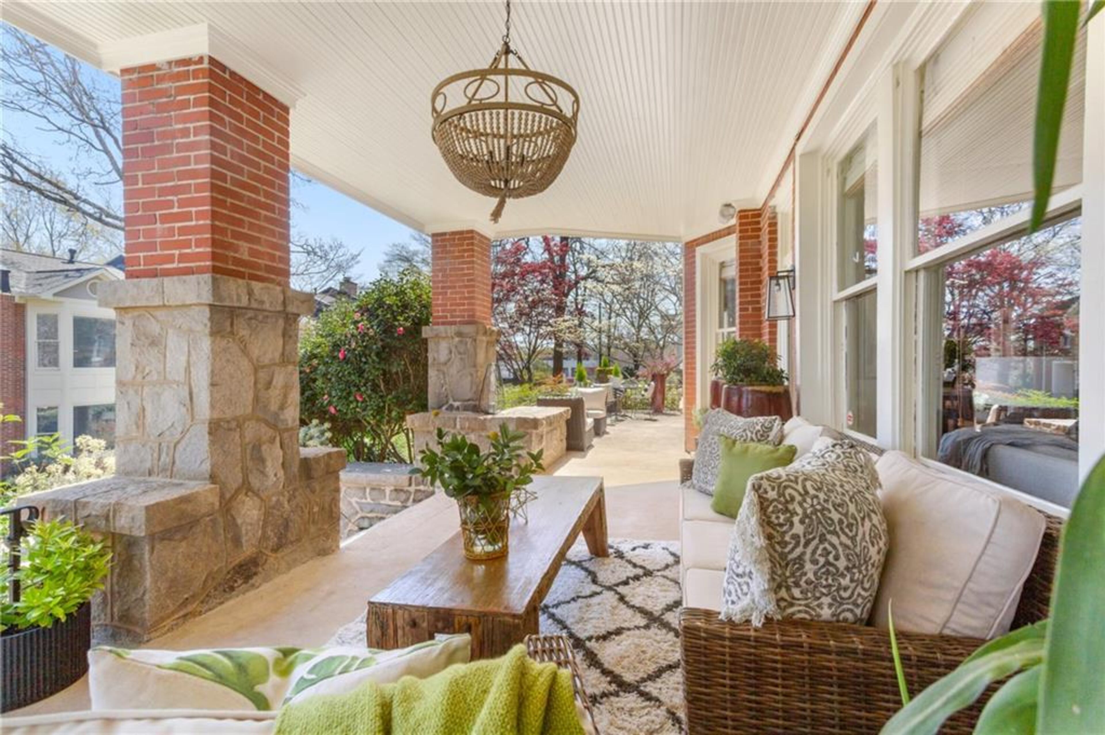 The front porch wraps around the front of the home all the way to the kitchen around the side.