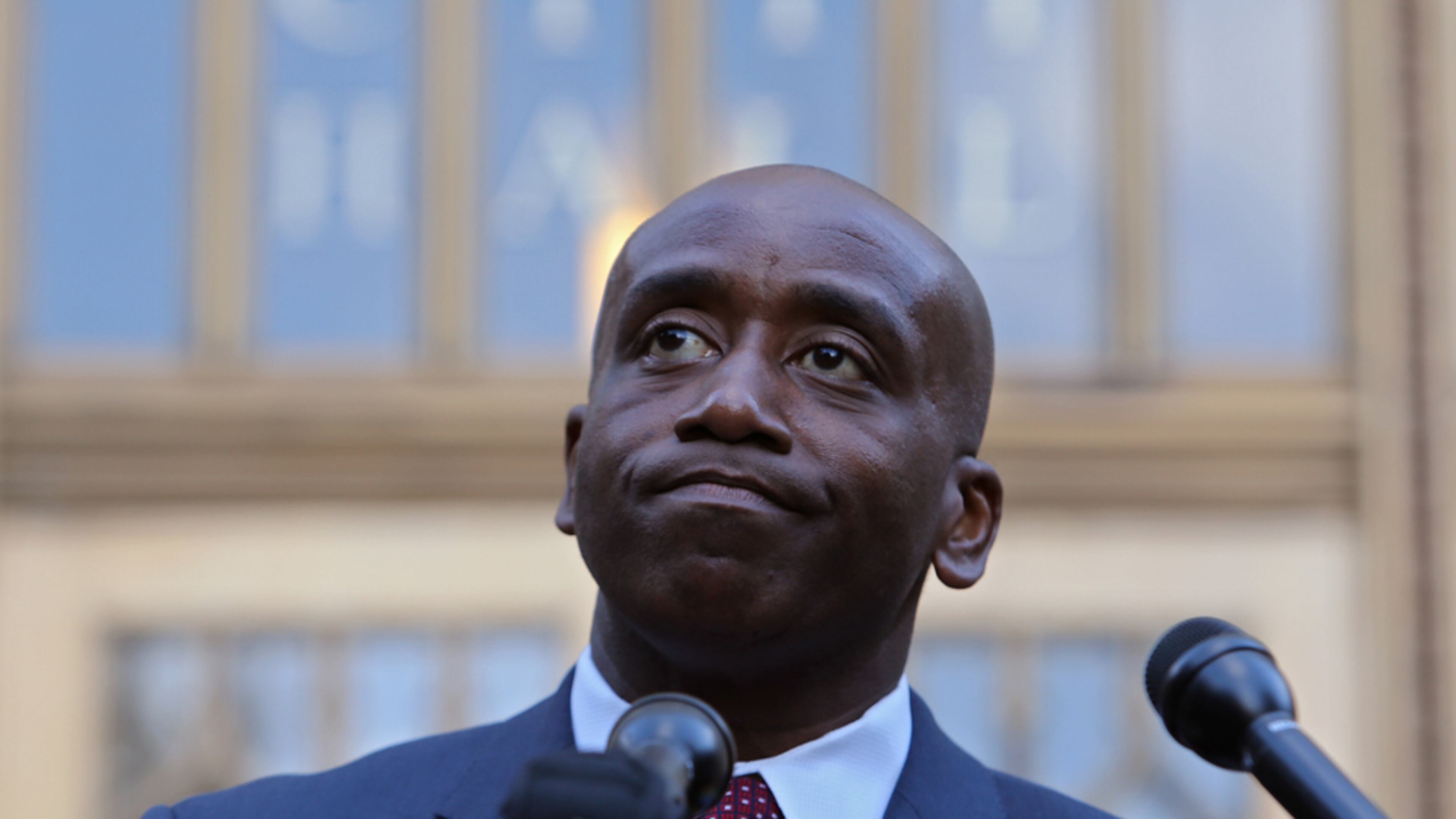 October 7, 2013 Atlanta: Atlanta City Councilman Lamar Willis pauses while speaking to the media Monday afternoon October 7, 2013 about being disbarred by the Georgia Supreme Court for ethical breaches. Willis' expression in this photo, combined with the City Hall lettering behind him, told the story of the day without showing the crowd of seniors who were bussed in to stand behind him as he talked. BEN GRAY / BGRAY@AJC.COM