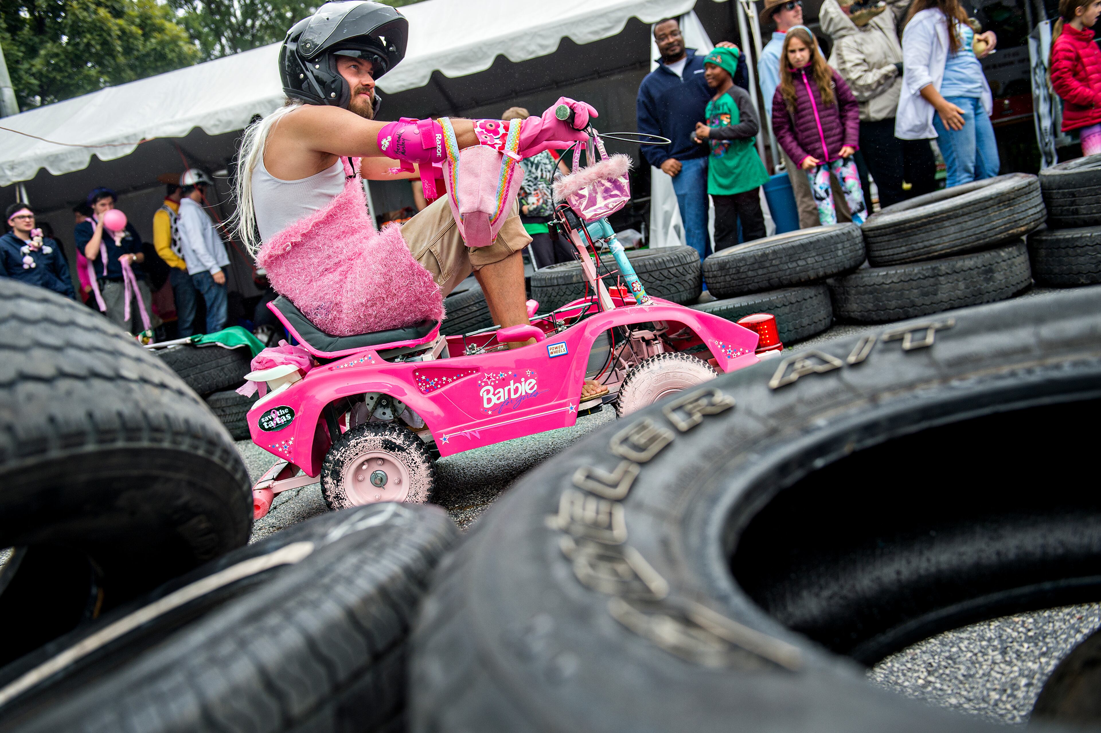 October 3, 2015 Decatur - Russell Fair rides in a small vehicle in the Moxie Challenge during the Atlanta Maker Faire in Decatur on Saturday, October 3, 2015. The fair showcased invention, creativity and resourcefulness from tech enthusiasts, crafters, homesteaders, scientists and garage tinkerers. JONATHAN PHILLIPS / SPECIAL