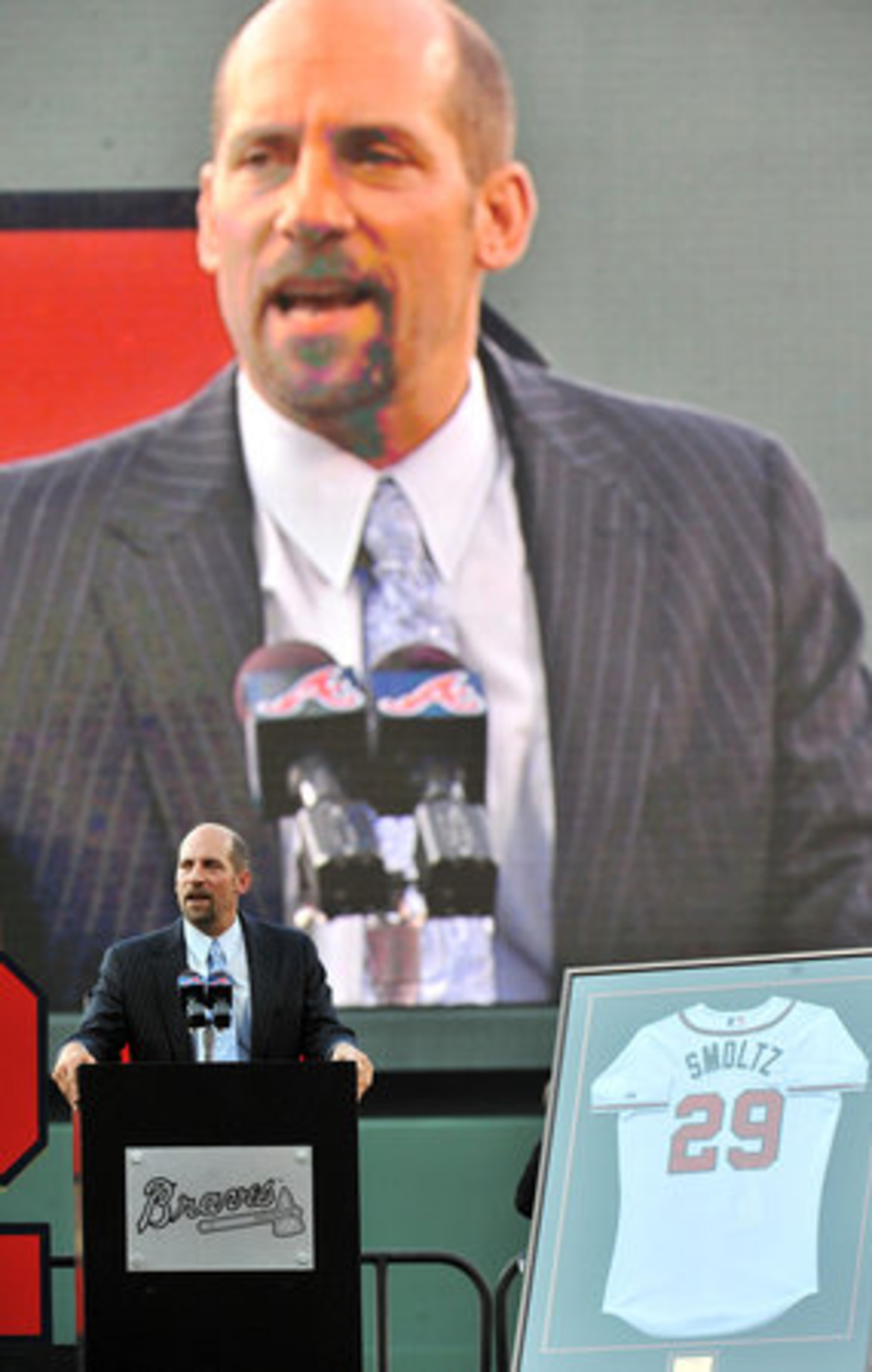 John Smoltz speaks during his number retirement ceremony.