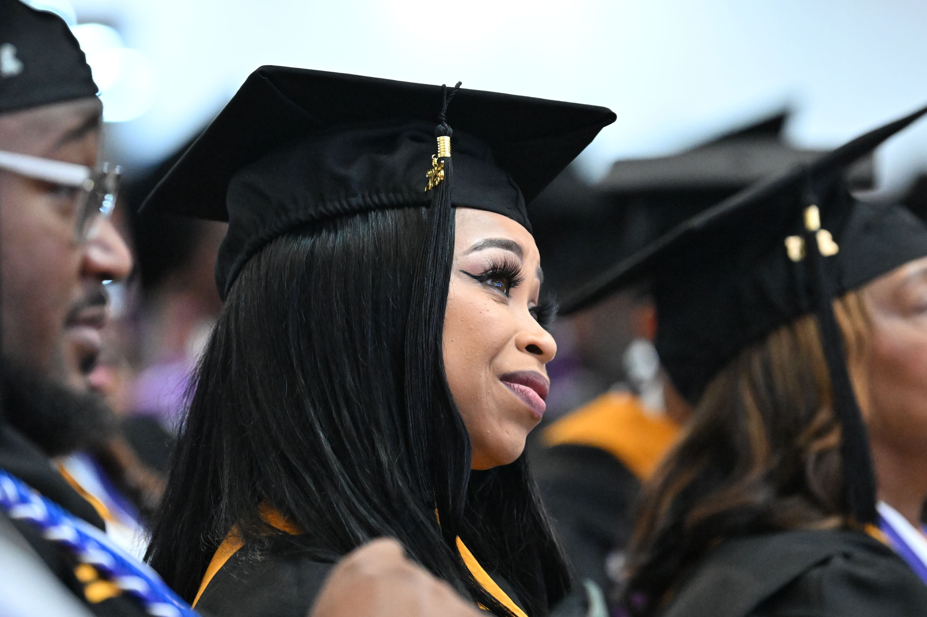 Graduates react during 2025 Morris Brown College commencement exercises at Saint Philip A.M.E. Church, Saturday, May 17, 2025, in Atlanta. (Hyosub Shin / AJC)