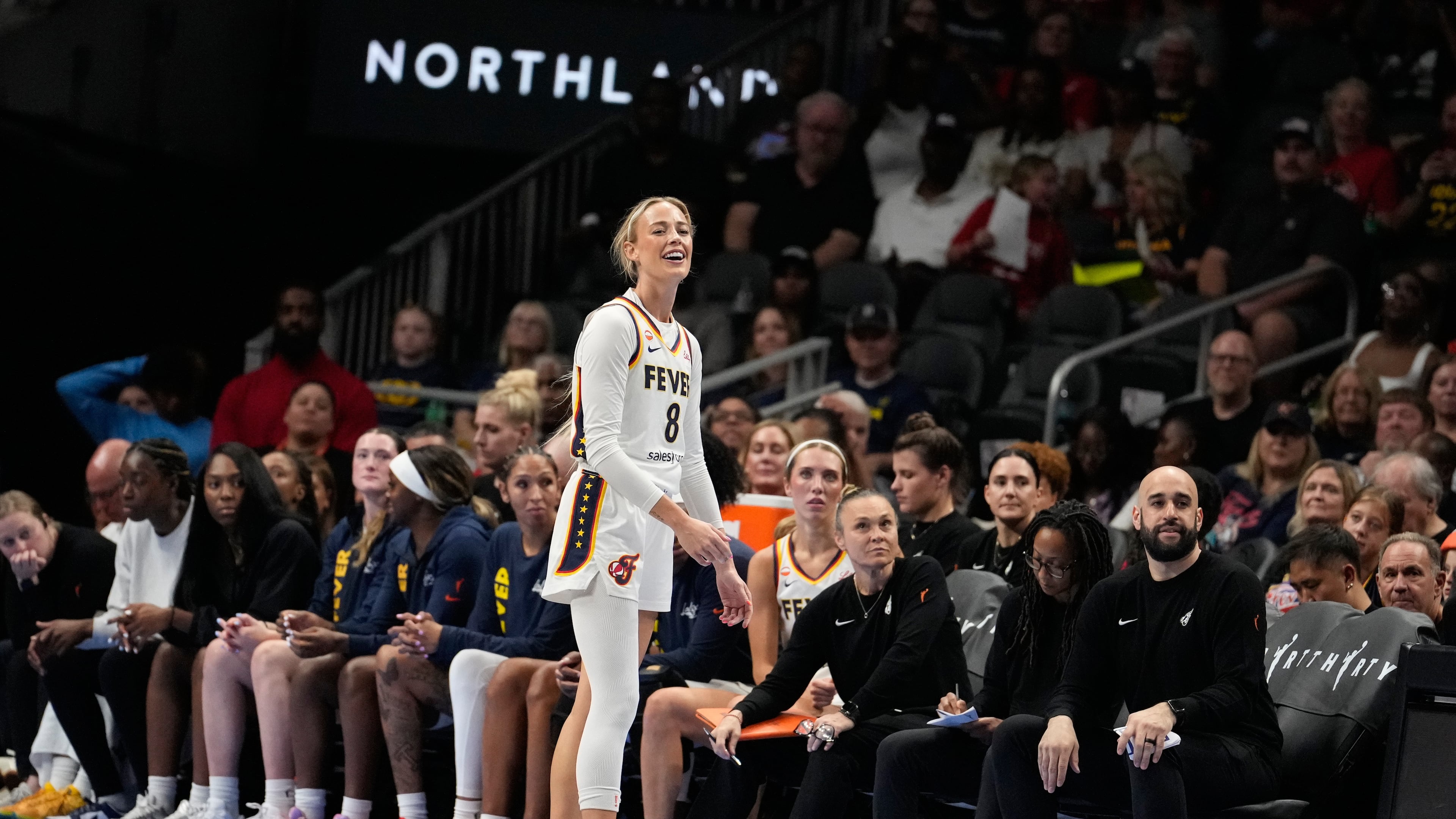 Indiana Fever guard Sophie Cunningham (8) reacts to a foul in the first half of an WNBA basketball game against the Atlanta Dream Sunday, Aug. 16, 2026, in Atlanta. (AP Photo/Brynn Anderson)