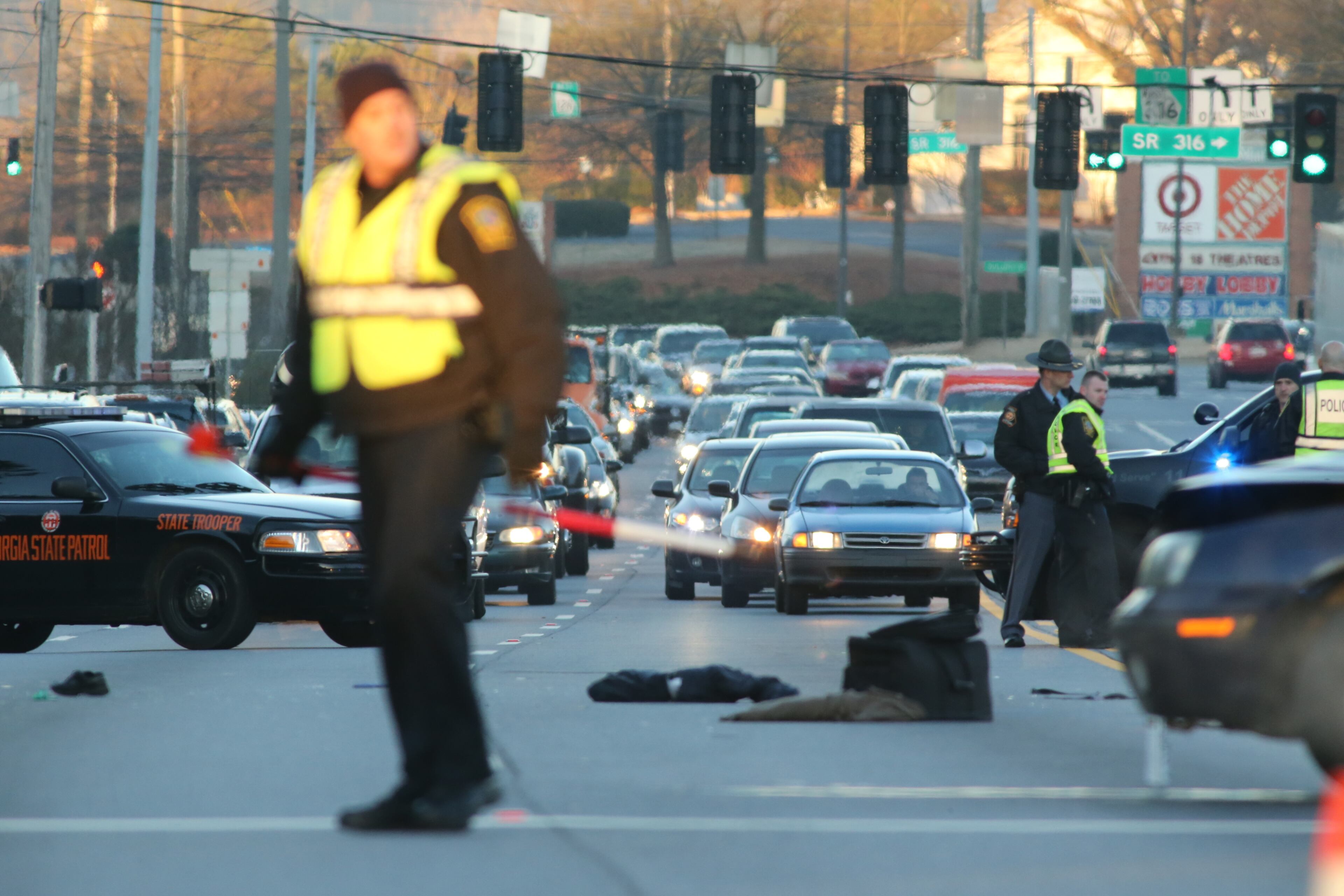 Lawrenceville police were investigating a pedestrian fatality early Thursday in front of Gwinnett Medical Center. The person was struck by a car and killed before 6 a.m. at the intersection of Duluth Highway and Medical Center Boulevard. On the ground is investigators' equipment.