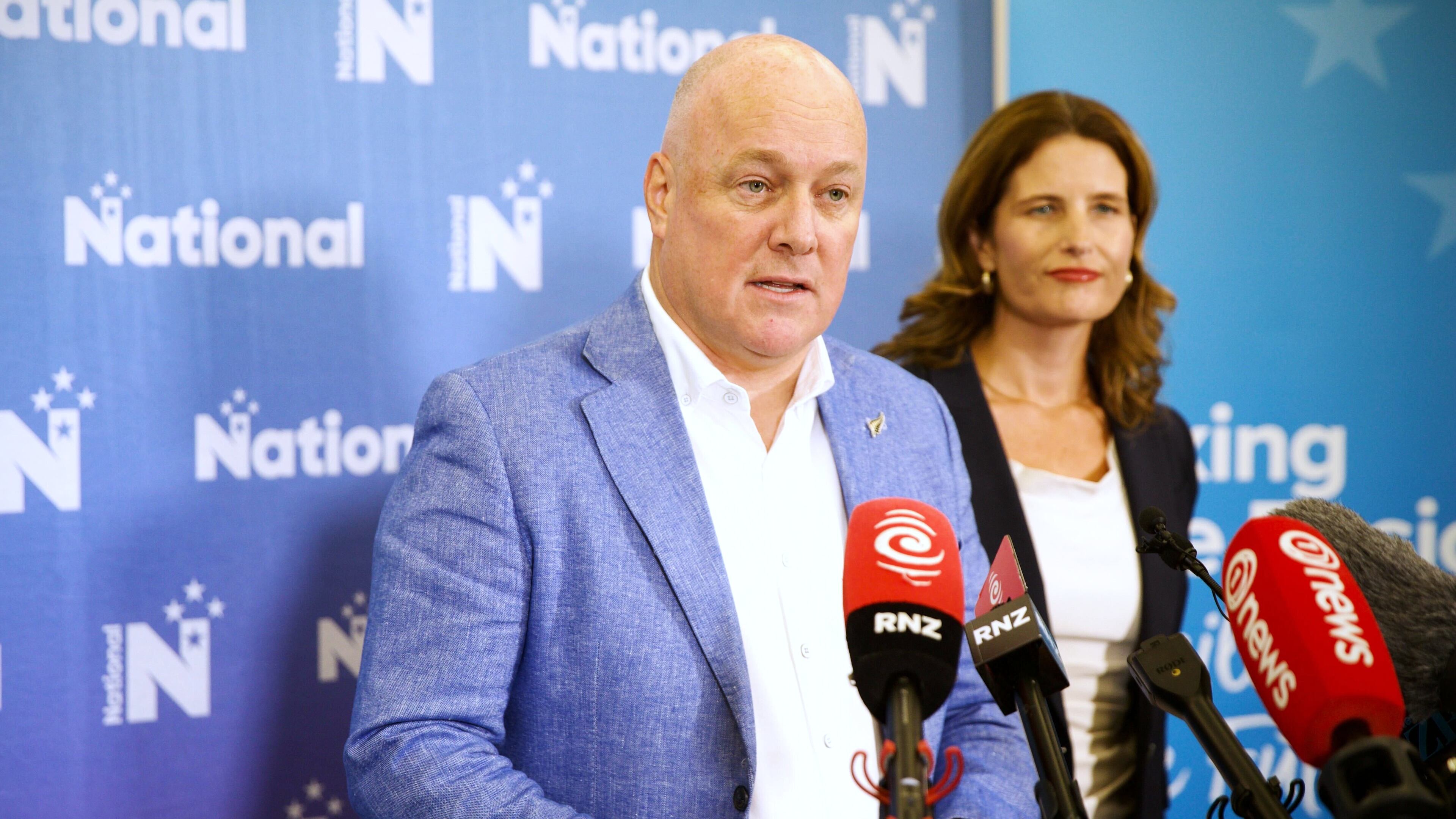 New Zealand Prime Minister Christopher Luxon announces the 2026 election date at the National annual away caucus in Christchurch Wednesday, Jan 21, 2026, as Finance Minister Nicola Willis, right, looks on. (Alden Williams/STUFF via AP)