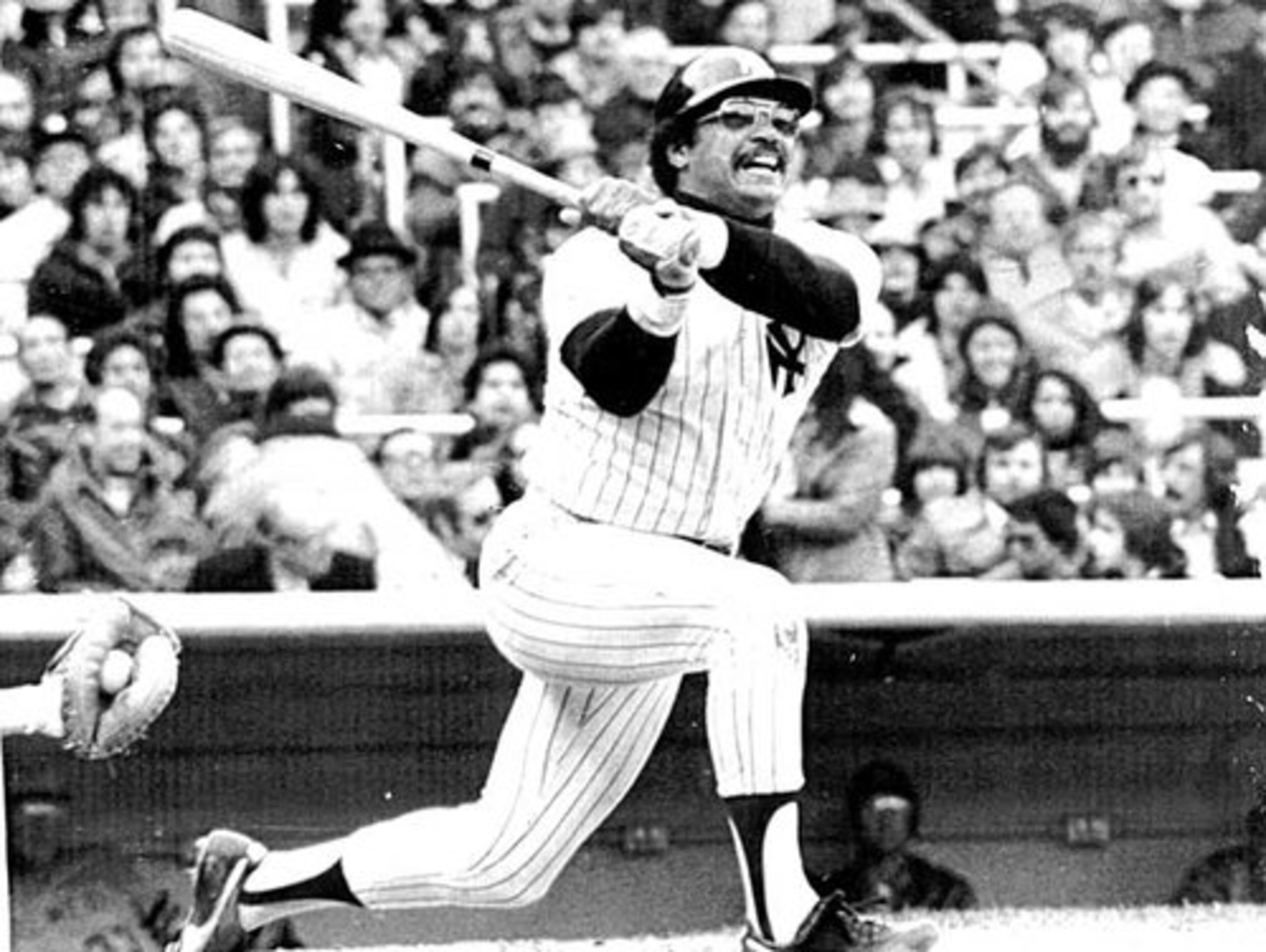... and what would that famous Reggie Jackson smile be sans shades, 'stache and swing?
