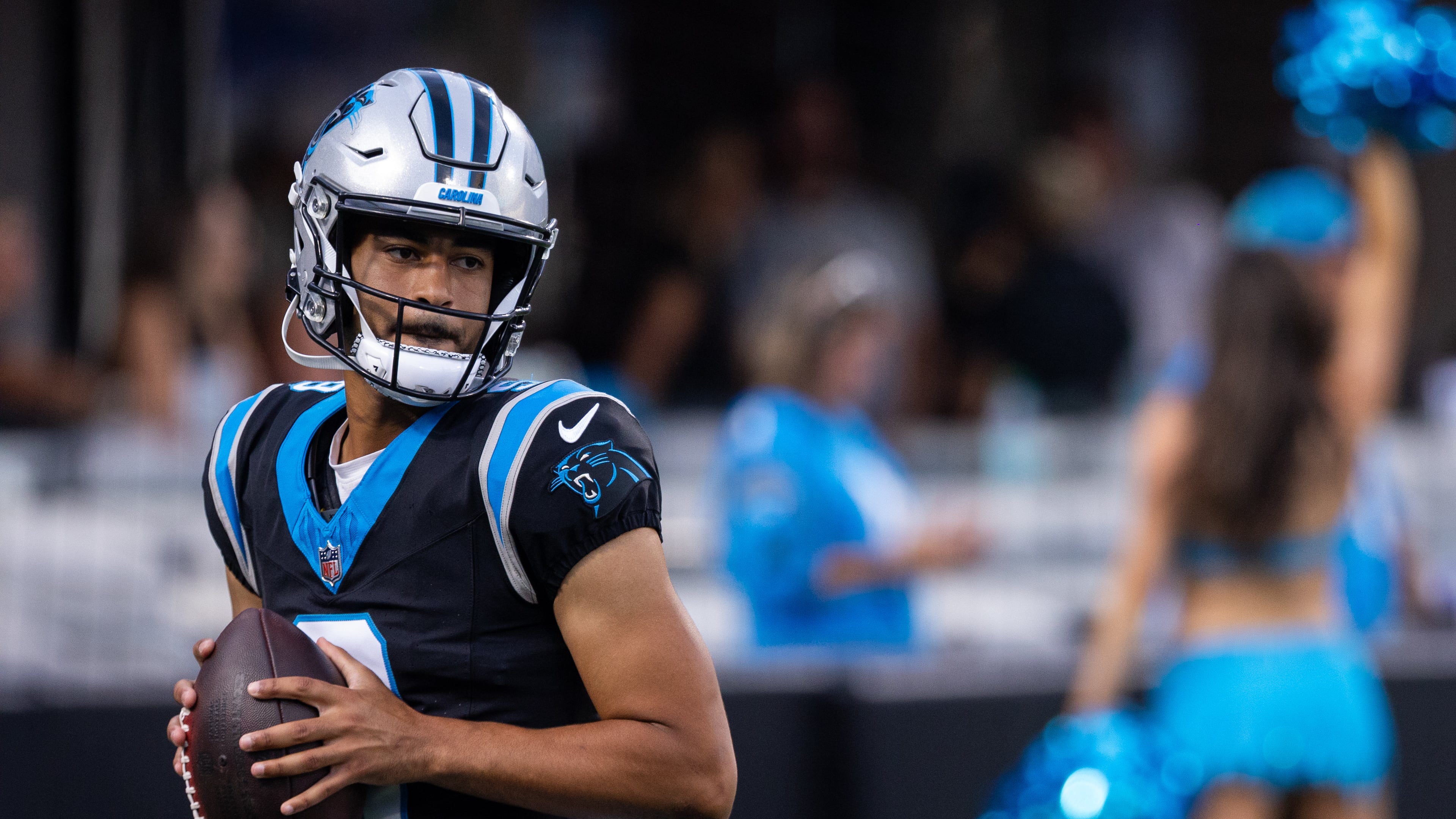 Carolina Panthers quarterback Bryce Young (9) warms up during the NFL football team's fan fest Friday, July 31, 2026, in Charlotte, N.C. (AP Photo/Scott Kinser)