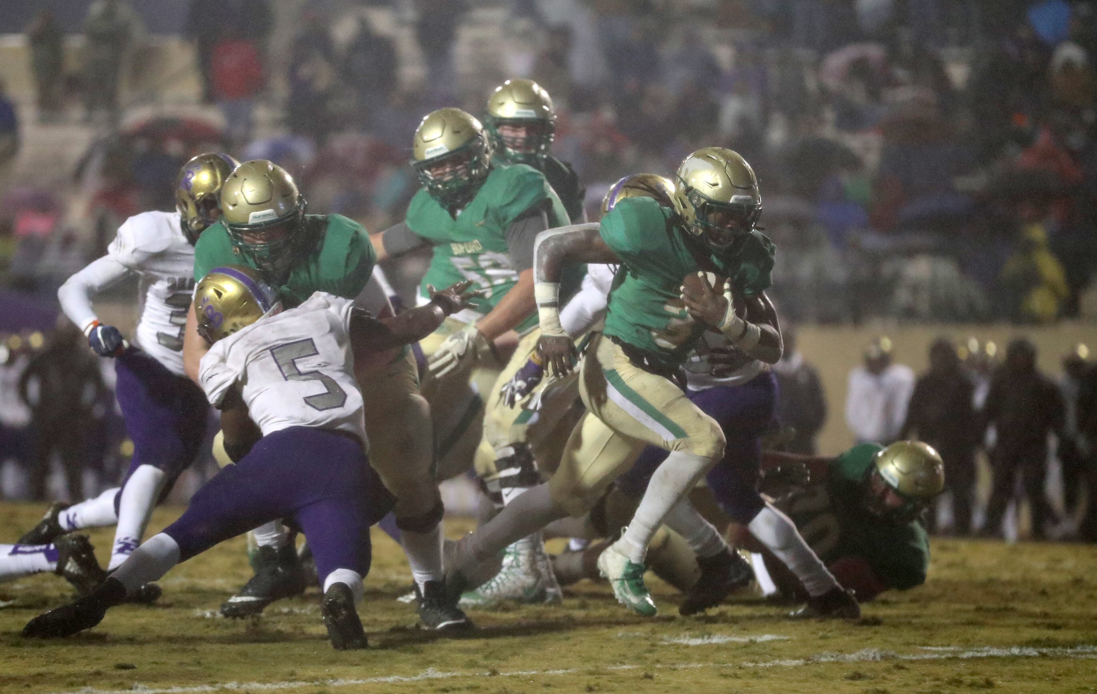 November 23, 2018 - Buford, Ga: Buford running back Derrian Brown (3) runs for a touchdown in the first half against Bainbridge at Buford High School Friday, November 23, 2018, in Buford, Ga. This is the quarter finals of the Class 5A state playoffs. (JASON GETZ/SPECIAL TO THE AJC)