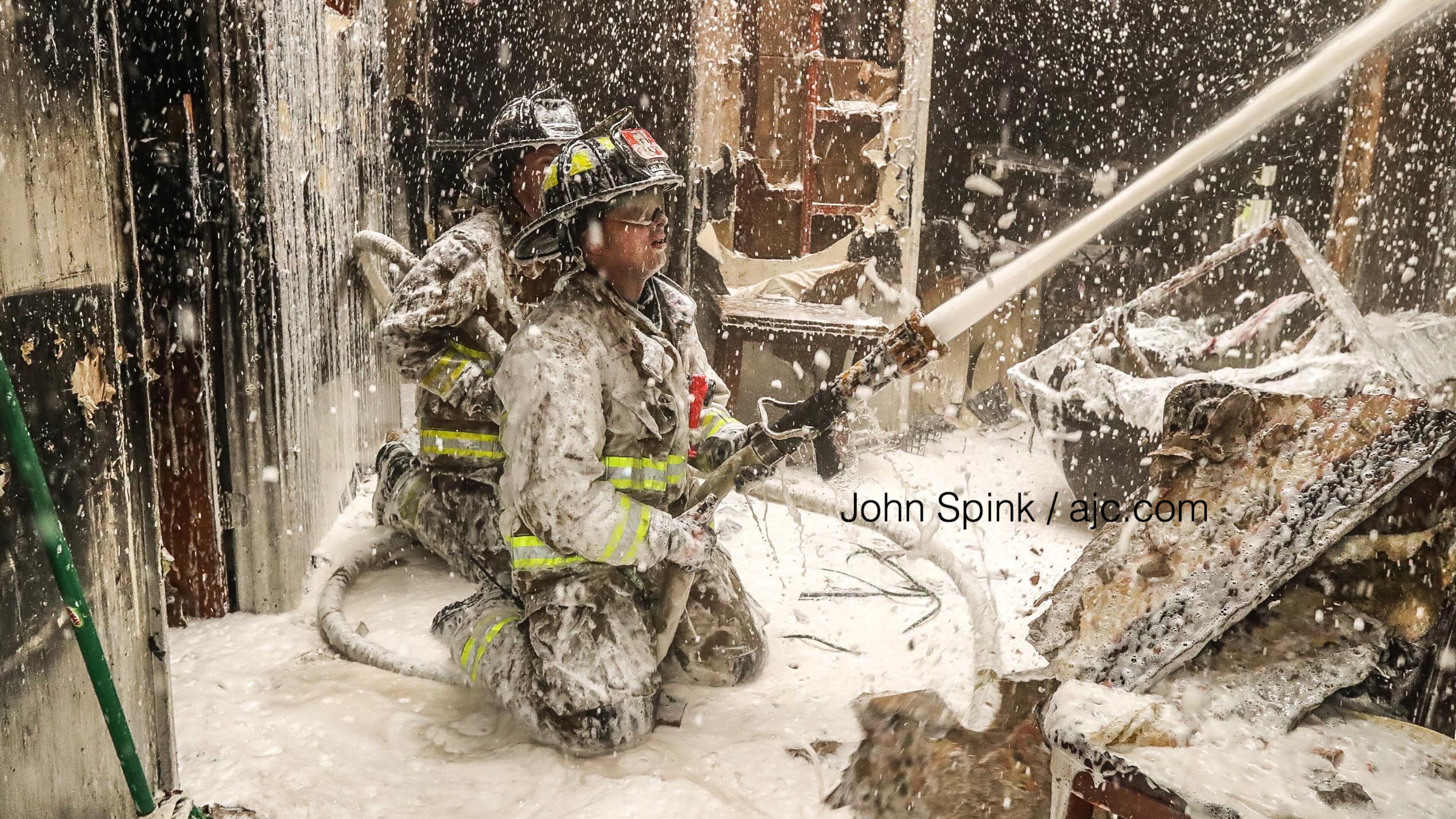 Atlanta firefighters used foam to treat hot spots following a blaze at a duplex in the 500 block of Hamilton E. Holmes Drive.