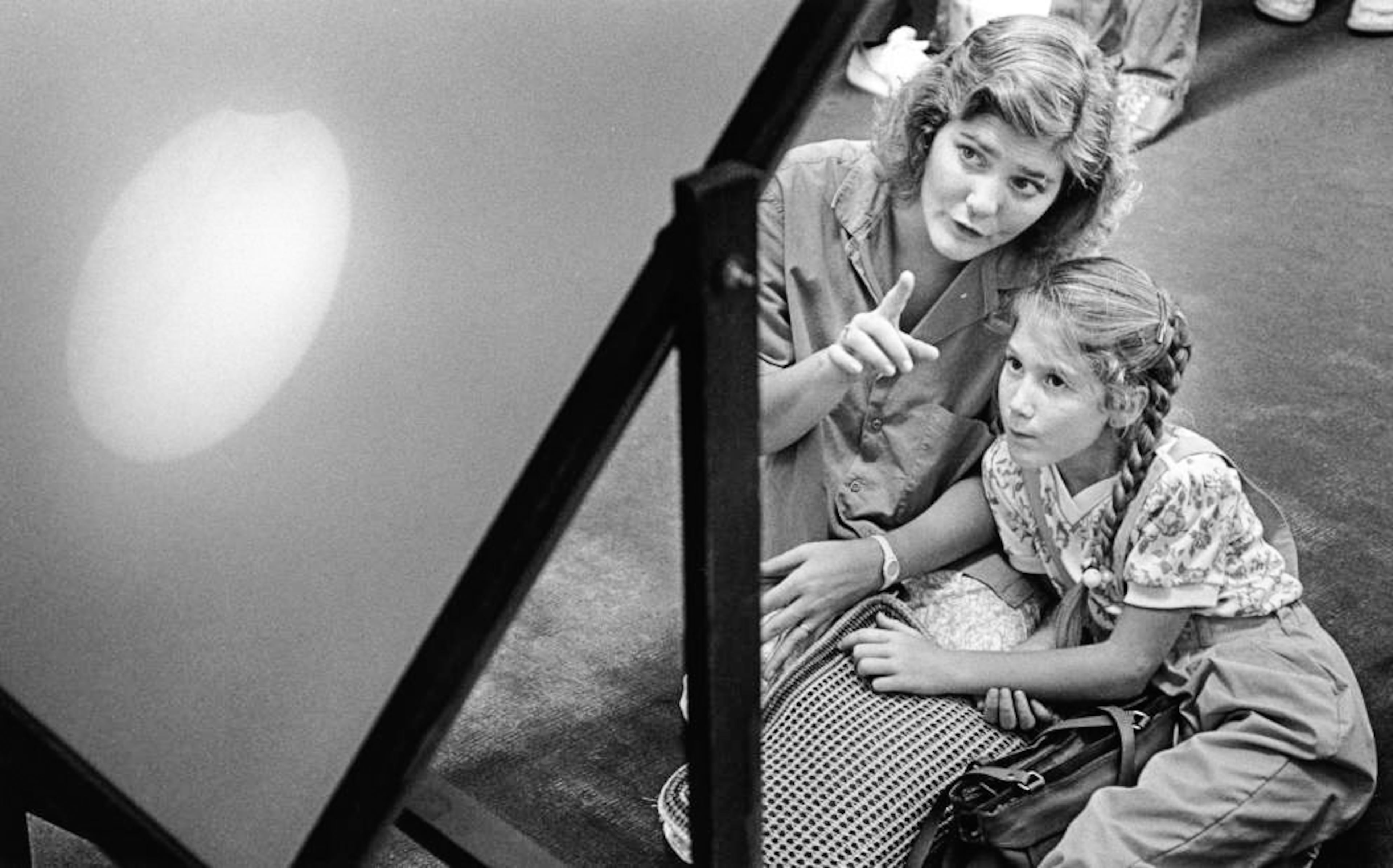 From Oct. 3, 1986: "Patricia Deavours and her daughter, Leah, watch the beginning of Friday's solar eclipse with the help of Fernbank Science Center equipment. The moon eventually blocked out 47 percent of the sun, but many Atlantans were too busy to notice."