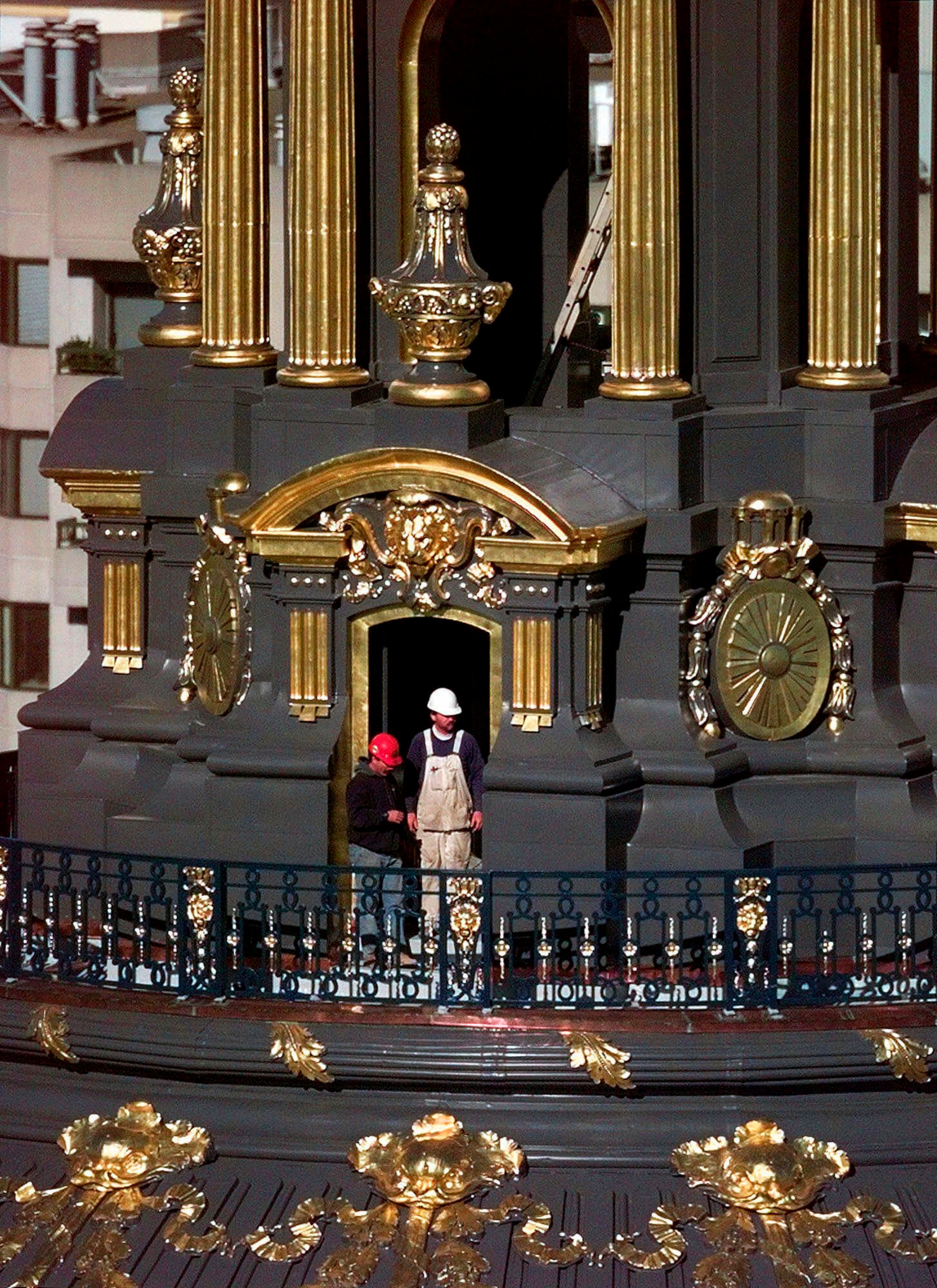 FILE: In this file photo from Wednesday, Dec. 23, 1998, workers put the finishing touches on the renovation of San Francisco's City Hall dome. More than 10 years after the Loma Prieta earthquake, City Hall was retrofitted, renovated and restored not just to its pre-quake state, but to it's original 1915 splendor. Friday is the 25th anniversary of the Loma Prieta earthquake that killed 63 people, injured almost 3,800 and caused up to $10 billion damage. (AP Photo/Ben Margot)