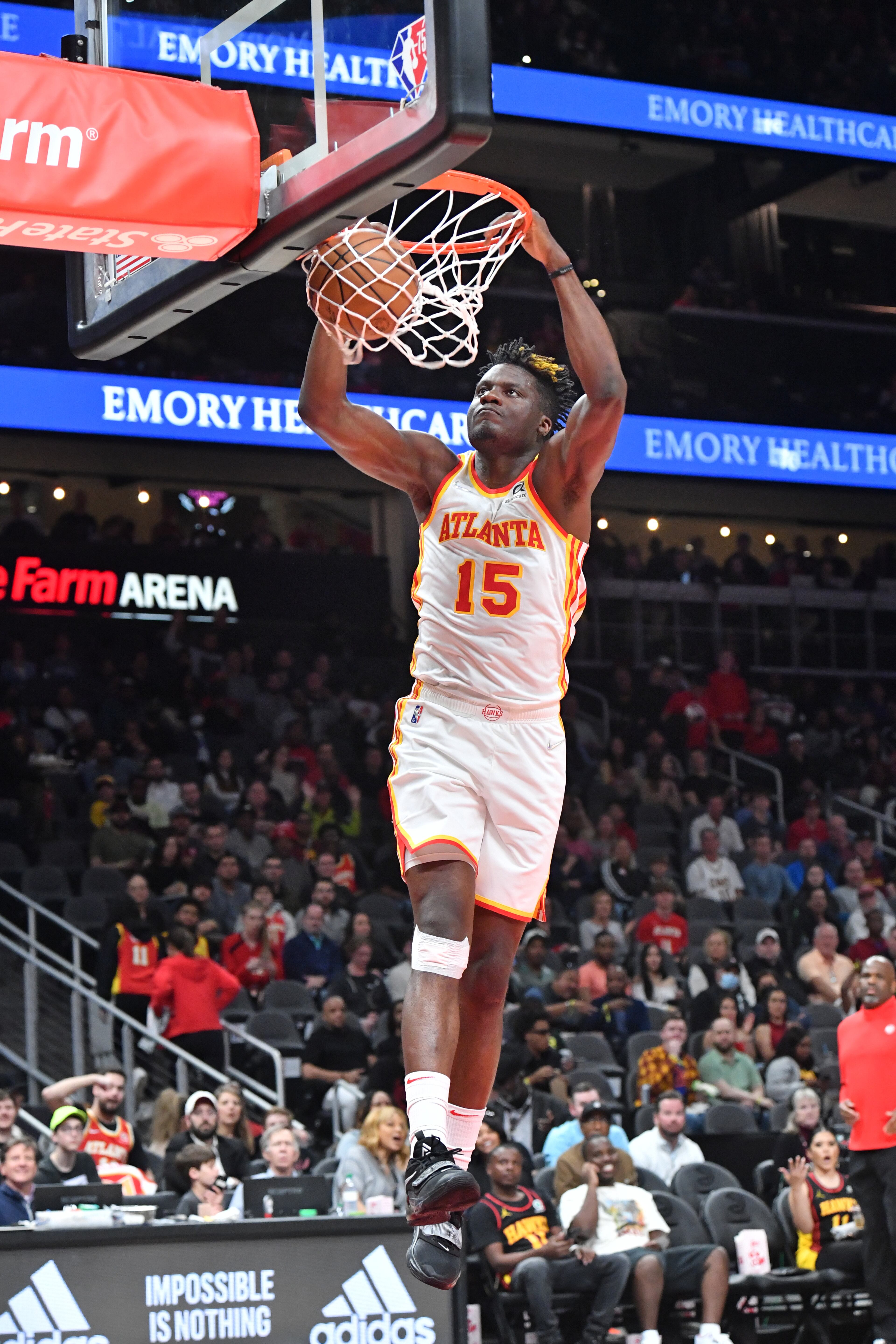 Hawks' center Clint Capela (15) dunks the ball during the first half in an NBA basketball game at State Farm Arena on Thursday, March 31, 2022. Atlanta Hawks won 131-107 over Cleveland Cavaliers. (Hyosub Shin / Hyosub.Shin@ajc.com)