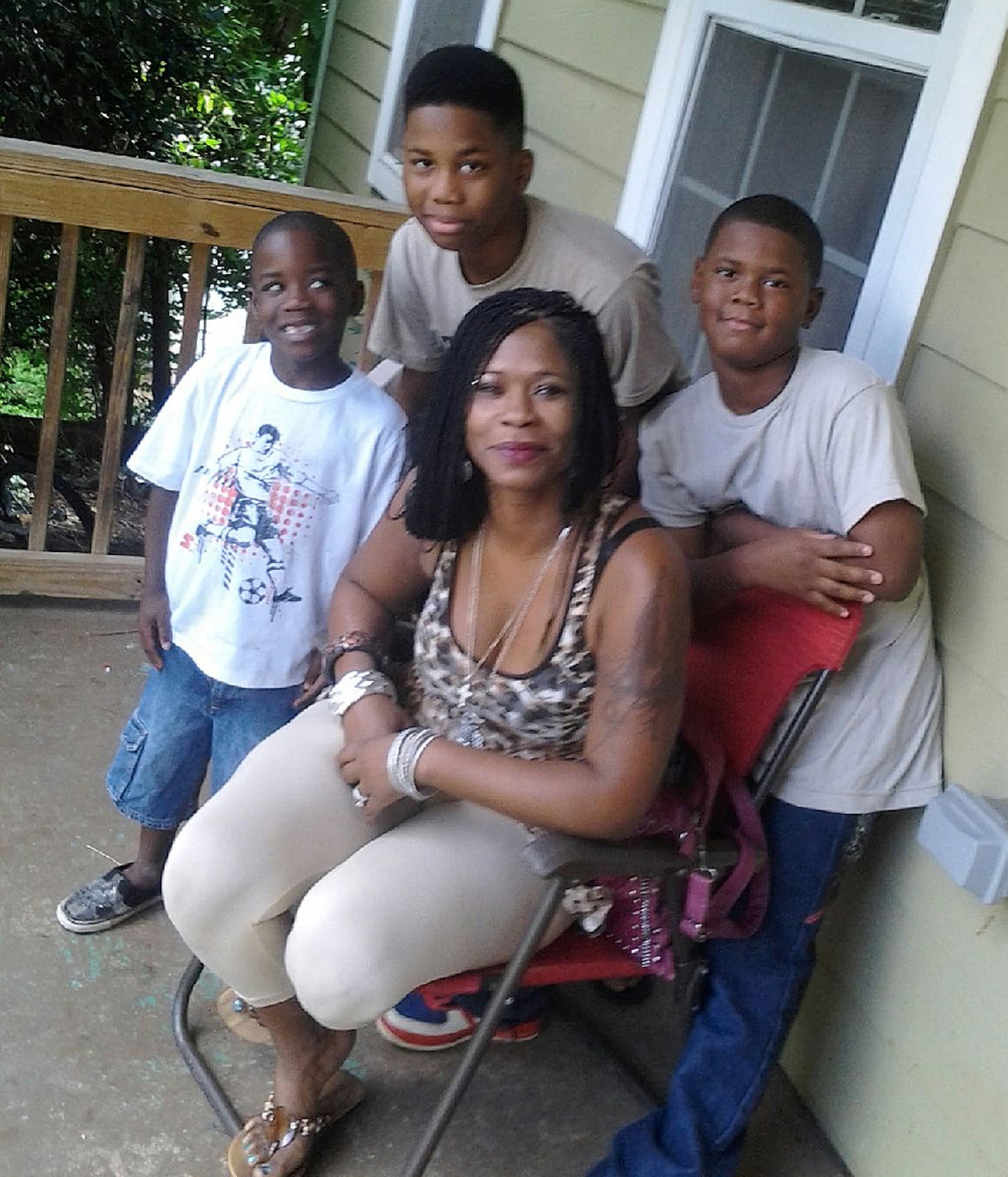 Donna is shown in healthier times with three of her four sons, Damyuss (from left), Dayzhon and and Dazmine.