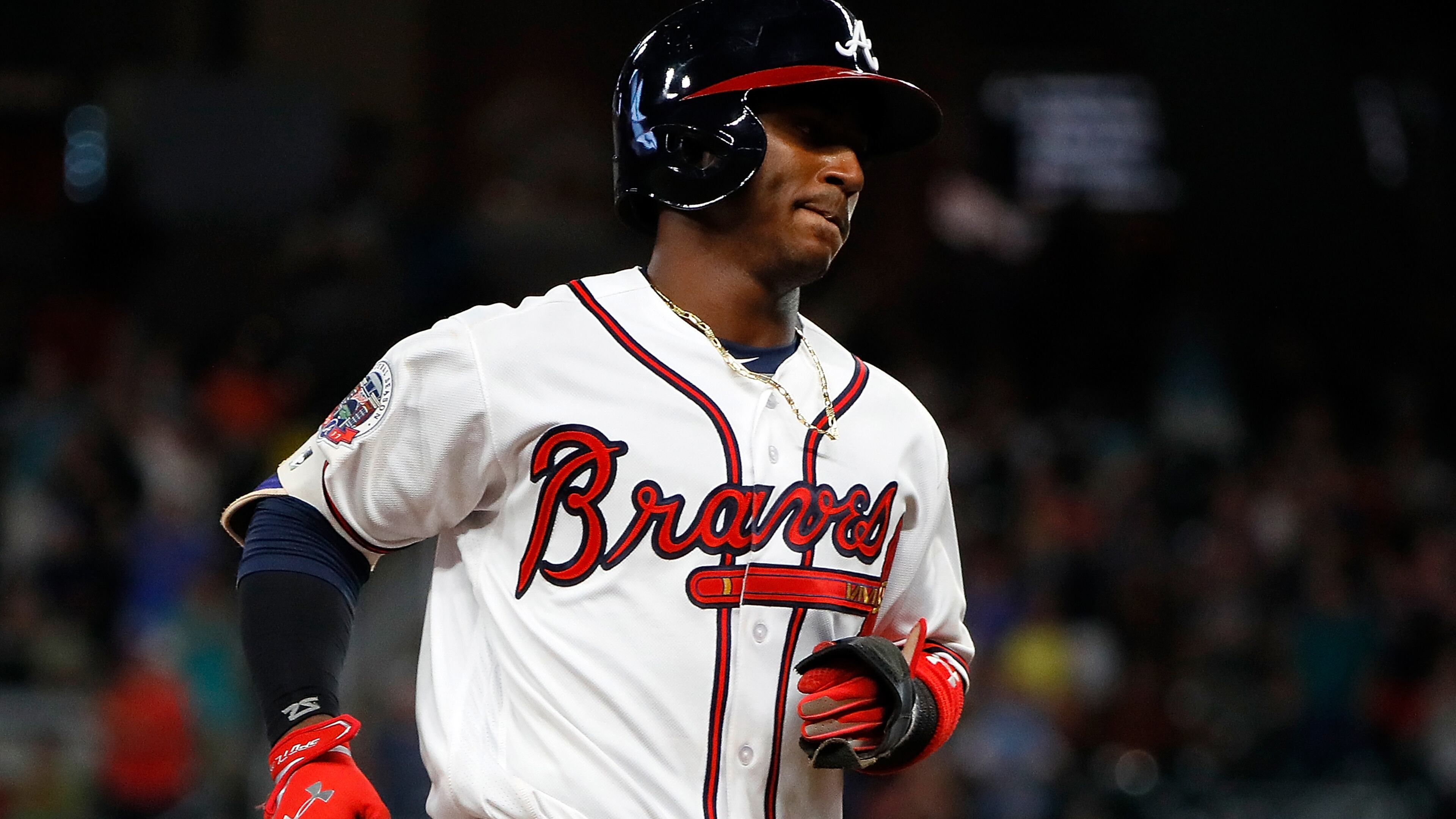 ATLANTA, GA - AUGUST 01: Ozzie Albies #1 of the Atlanta Braves makes his MLB debut as he rounds third base on a two-run homer hit by Johan Camargo #17 during the eighth inning against the Los Angeles Dodgers at SunTrust Park on August 1, 2017 in Atlanta, Georgia. (Photo by Kevin C. Cox/Getty Images)