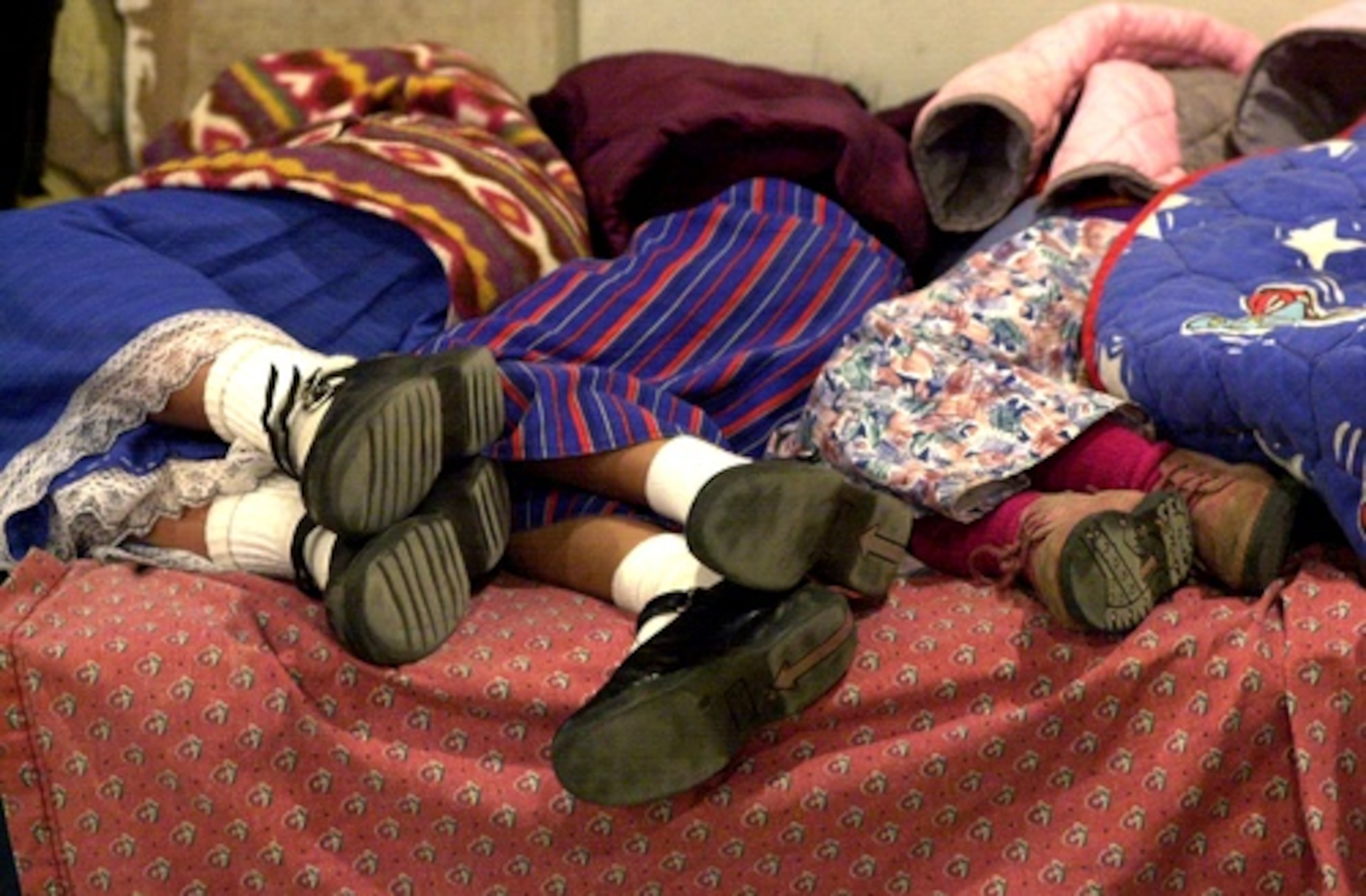 Children slept on a cot while adults held a service. The members were strict in their beliefs and would gather nearly everyday for a service. (W.A. BRIDGES/FILE)