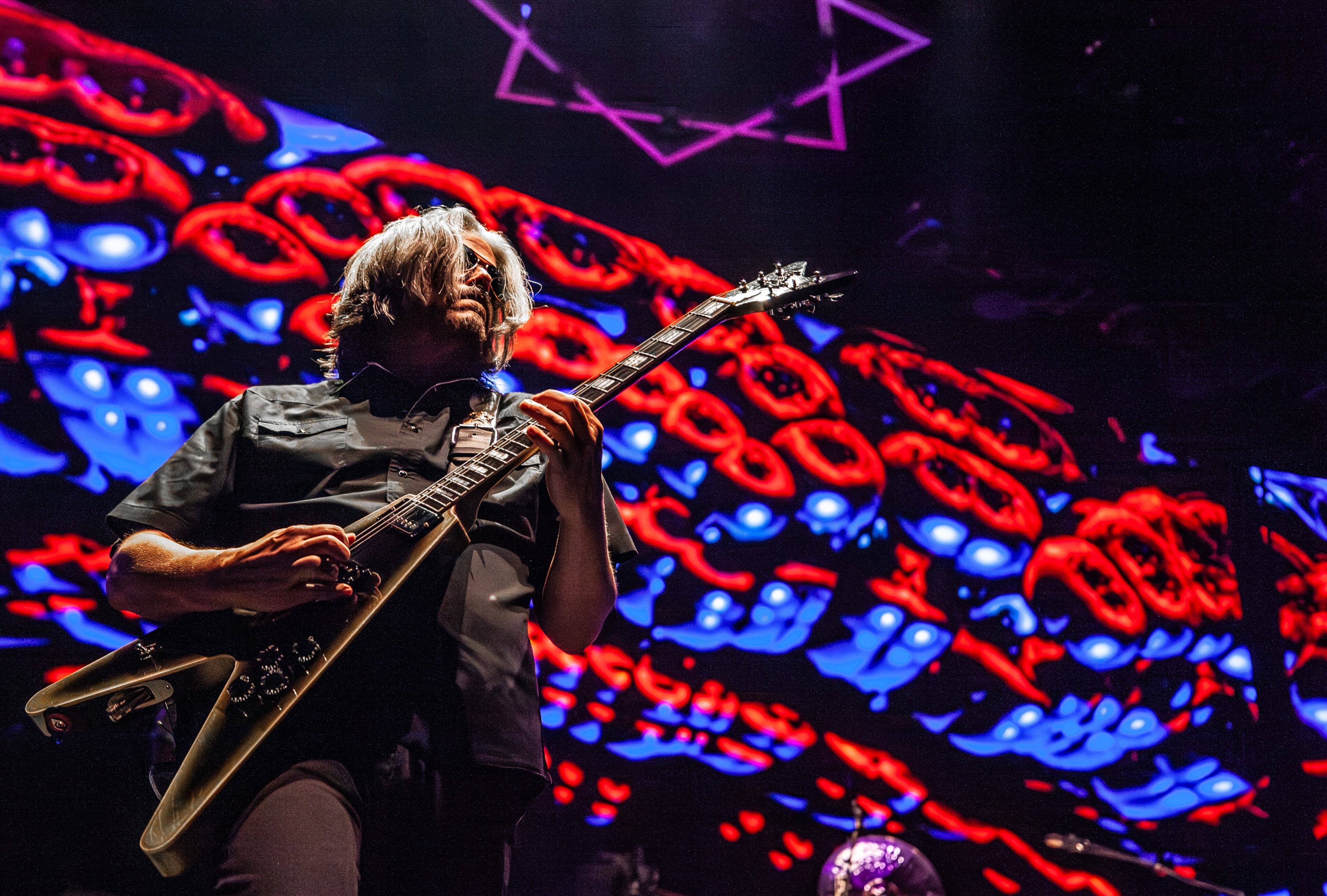 Nov. 17, 2021 -- Atlanta, Ga: Adam Jones shreds with Tool as they play to a sold out crowd at State Farm Arena. Photo taken Tuesday January 24, 2024 at State Farm Arena. (Ryan Fleisher for The Atlanta Journal-Constitution)