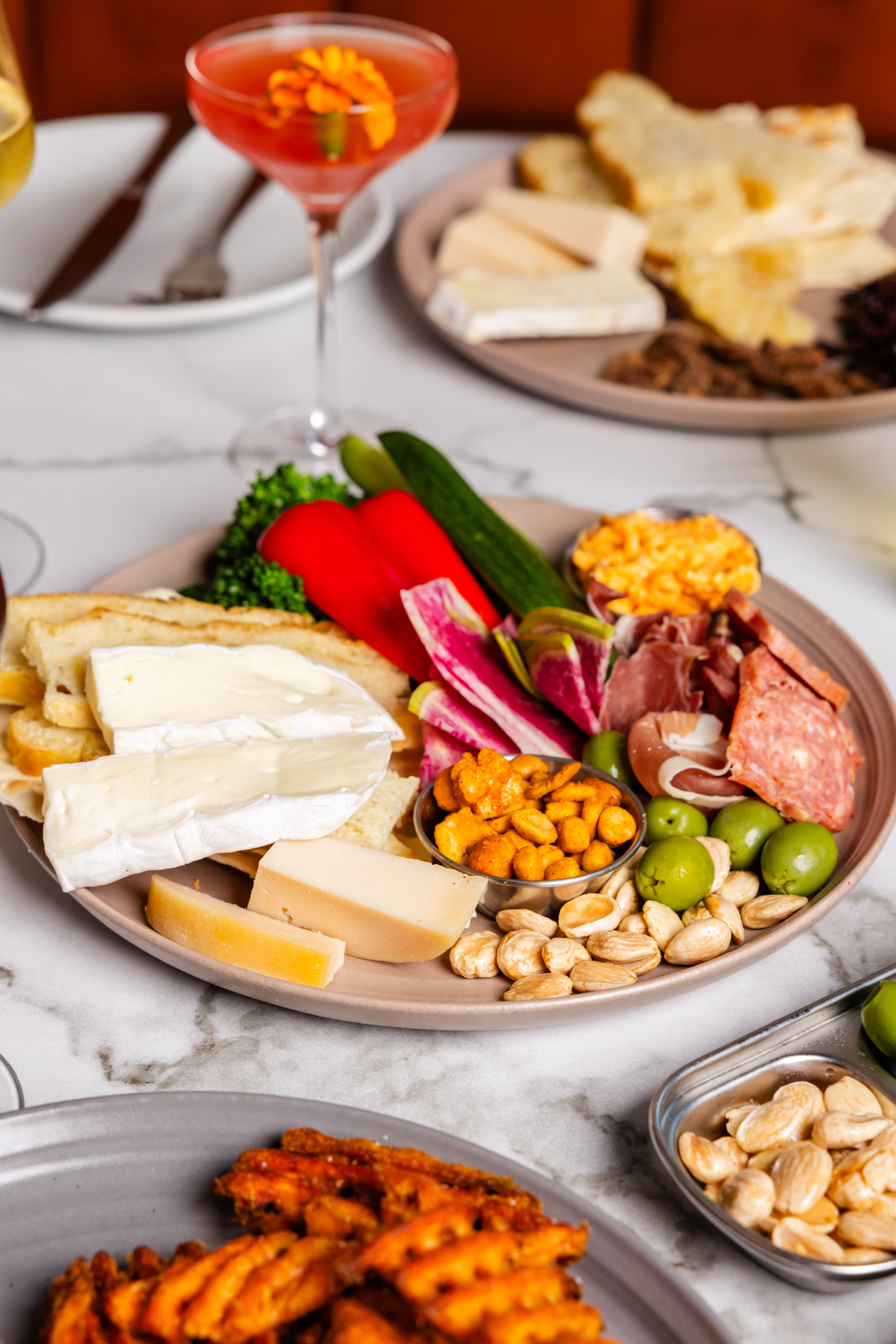 The generous grazing board is an excellent accompaniment for a glass of wine or two at Side Saddle Wine Saloon. (Courtesy of Rebecca Carmen/Side Saddle Wine Saloon)
