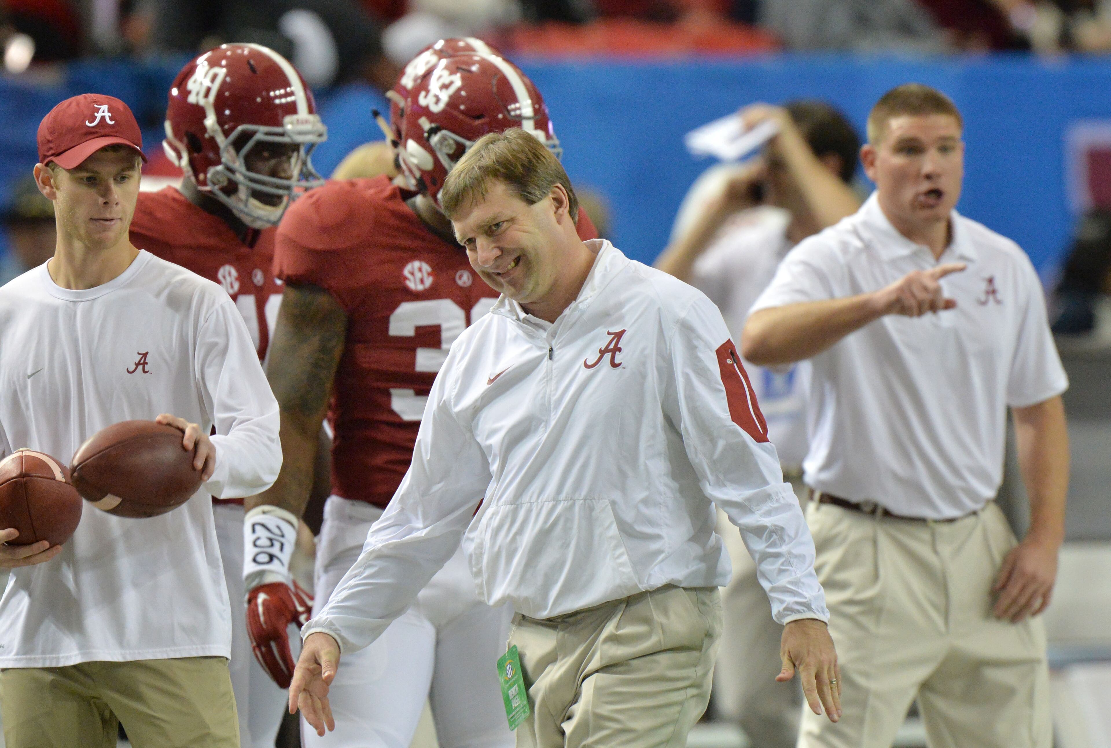 Alabama Crimson Tide defensive coordinator and soon to be Georgia head coach, Kirby Smart, smiles during their warm-ups before the SEC Championship against the Florida Gators at the Georgia Dome on Saturday December 5, 2015. HYOSUB SHIN / HSHIN@AJC.COM