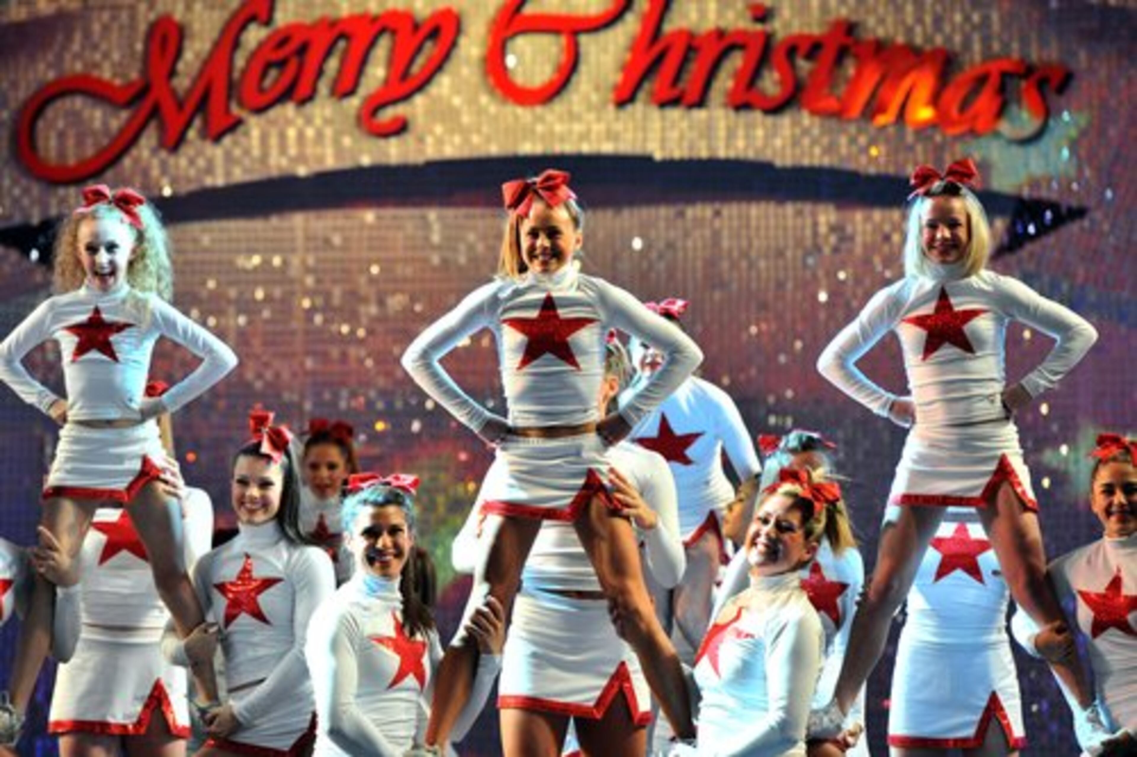 Macy's All-Star Cheer squad members perform during the Macy's Great Tree Lighting Show at Lenox Square Mall on Thursday, November 24, 2011.