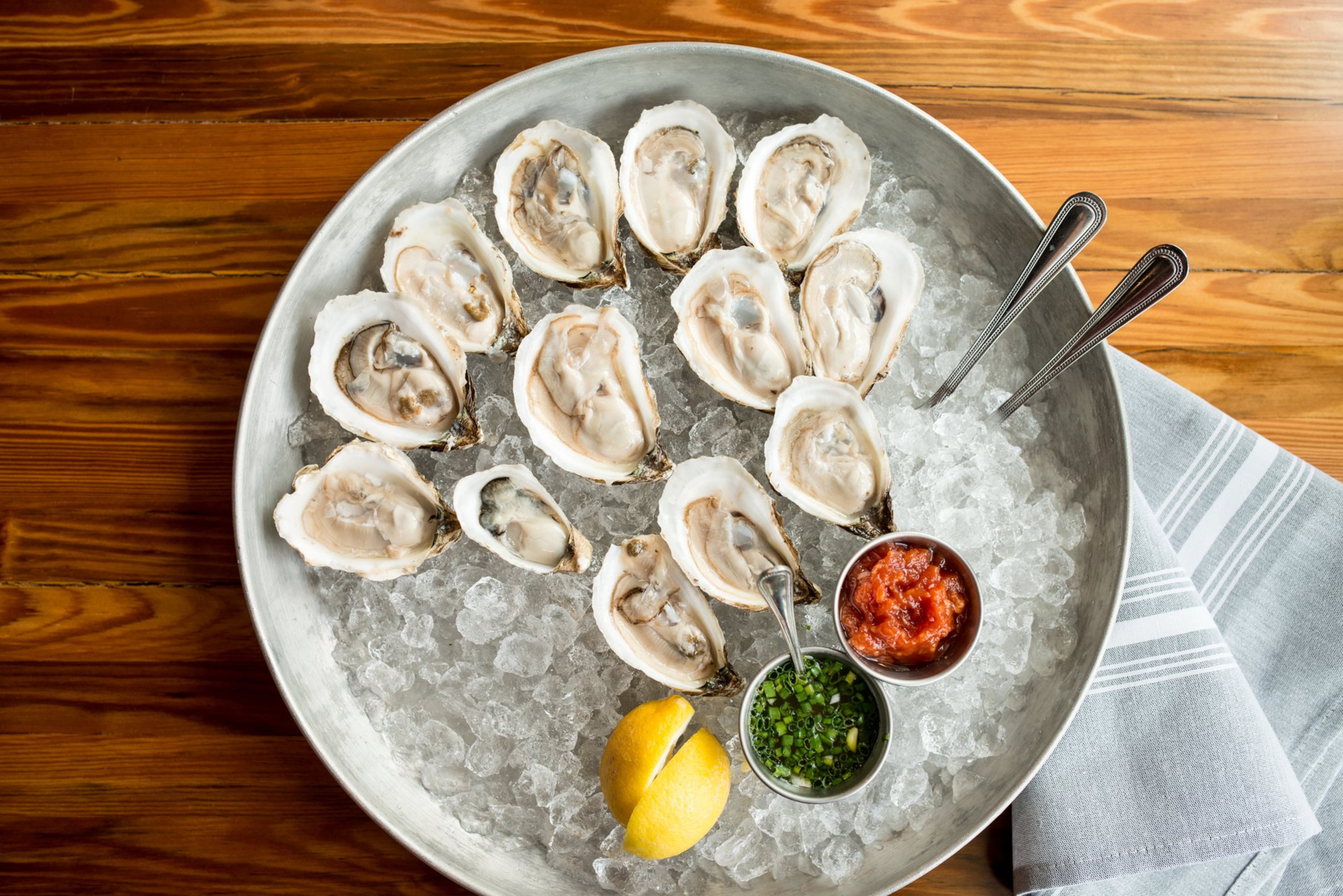 The Lowcountry Oyster Festival hosts oyster-eating and oyster-shucking contests at Boone Hall Plantation in Charleston, S.C. FILE