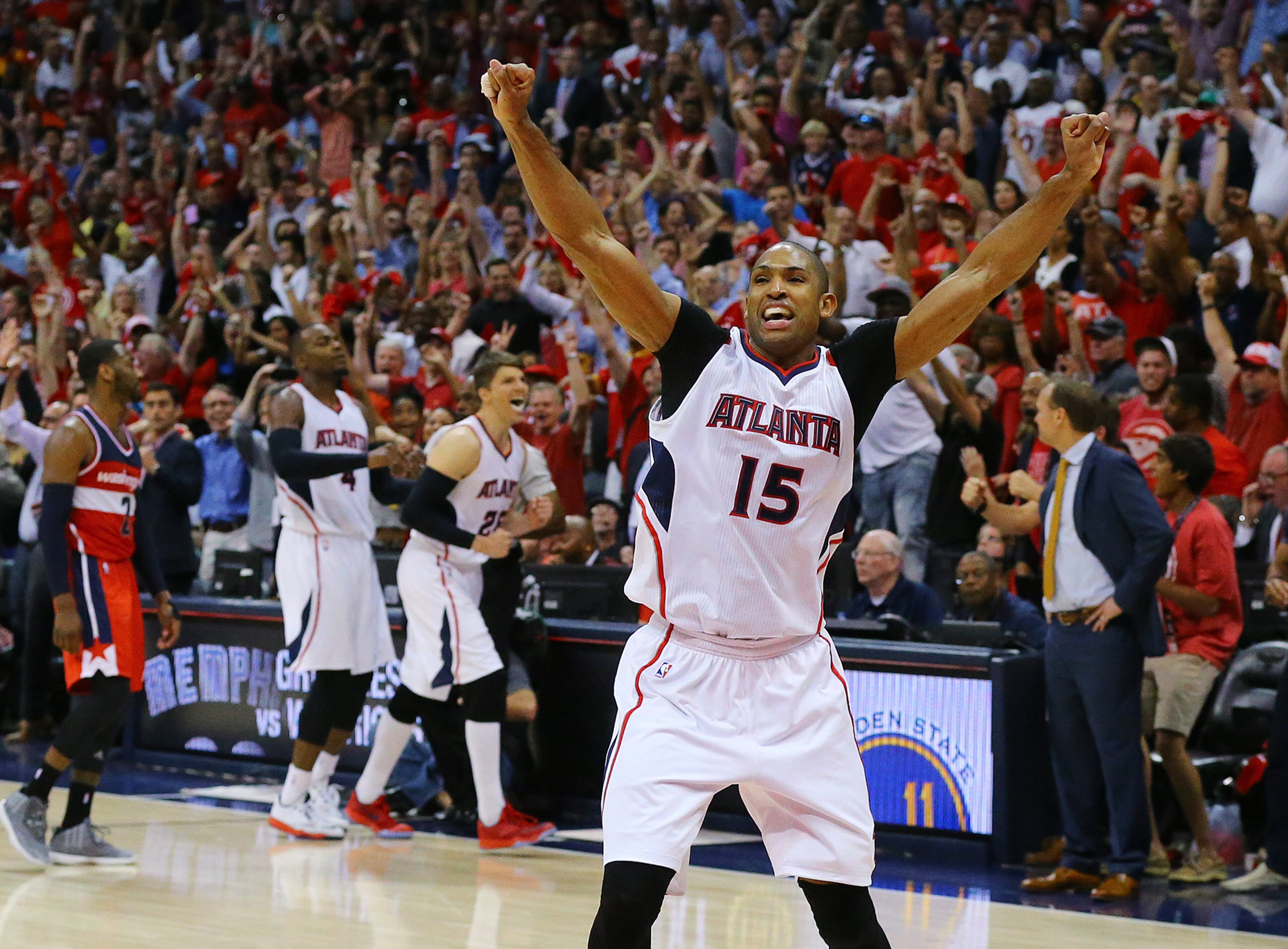 Hawks center Al Horford reacts after hitting the game winning shot to beat the Wizards 82-81 in their Eastern Conference Semifinals game 5 on Tuesday, May 13, 2015, in Atlanta. Curtis Compton / ccompton@ajc.com