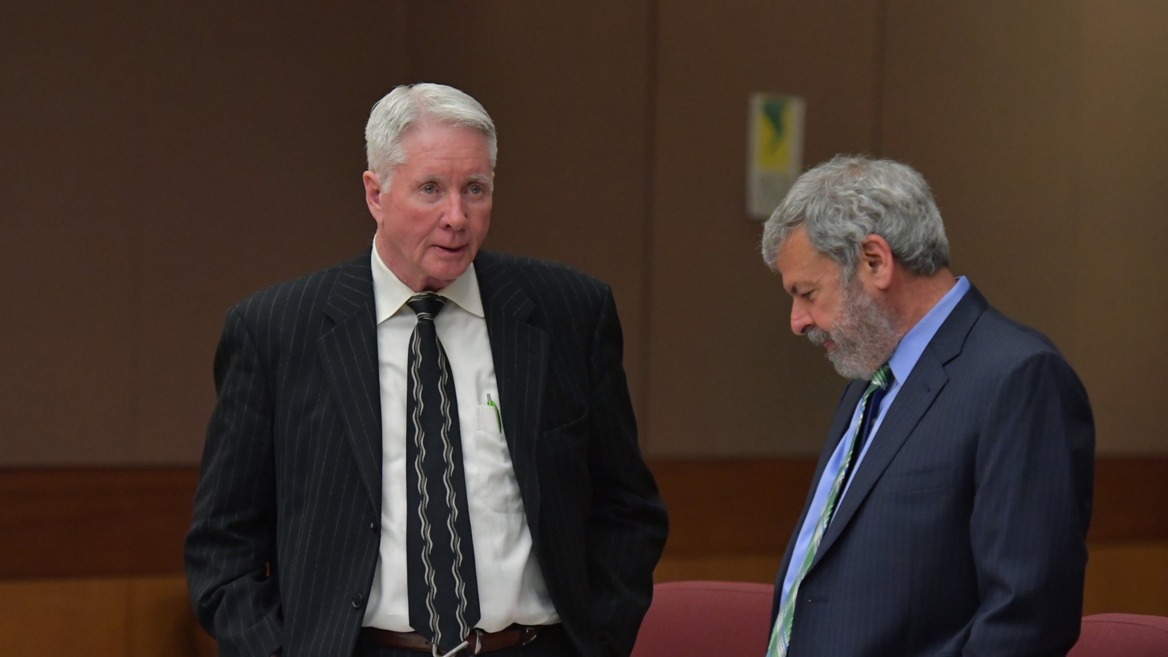 February 28, 2018 Atlanta - Tex McIver (left) talks with defense attorney Don Samuel during a pretrial hearing before Fulton County Chief Judge Robert McBurney on Wednesday, February 28, 2018. HYOSUB SHIN / HSHIN@AJC.COM