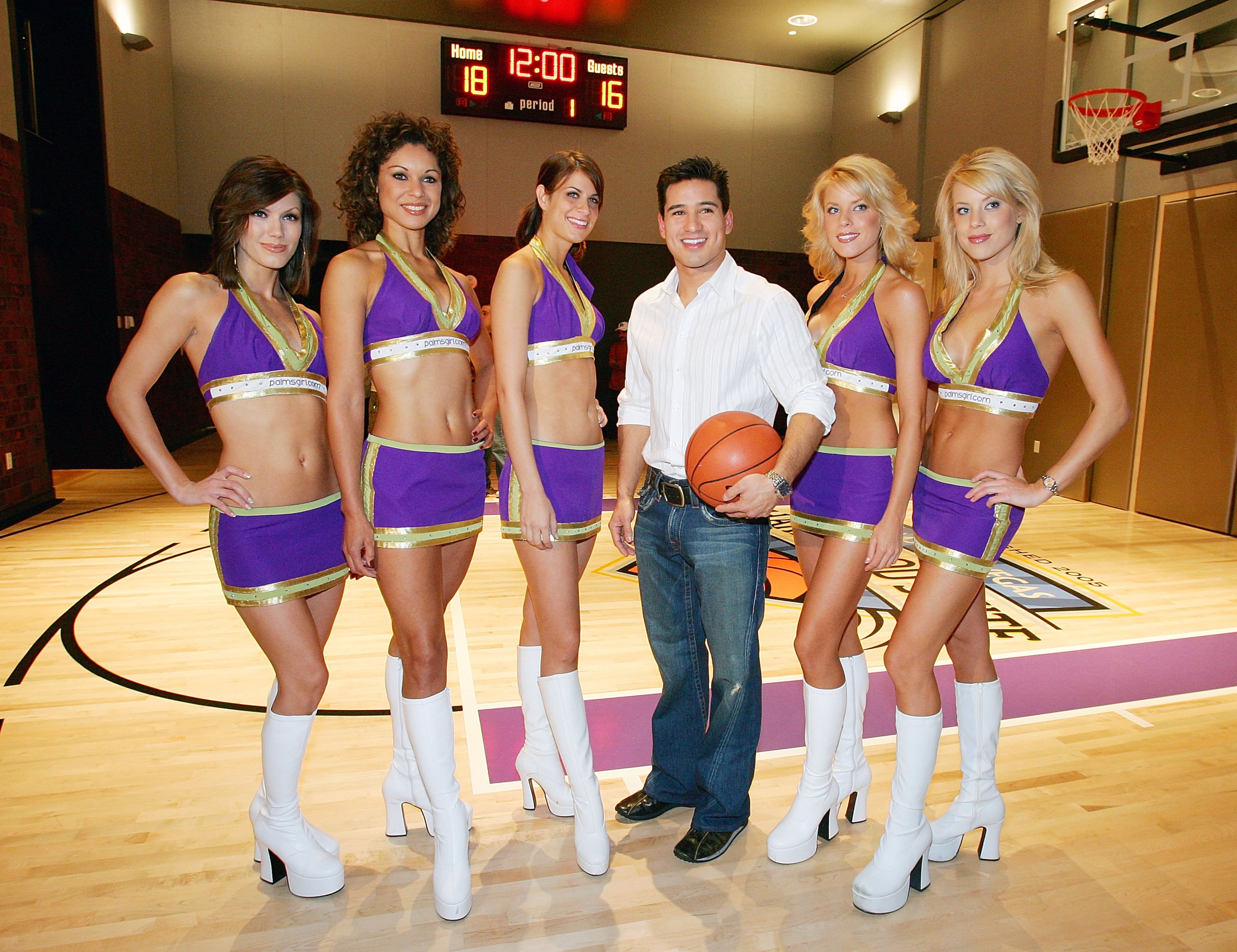 Palms girls models pose with television personality Mario Lopez during a party held to introduce the Hardwood Suite in the new $600 million, 347-room Fantasy Tower under construction at the Palms Casino Resort on Oct. 27, 2005, in Las Vegas.
