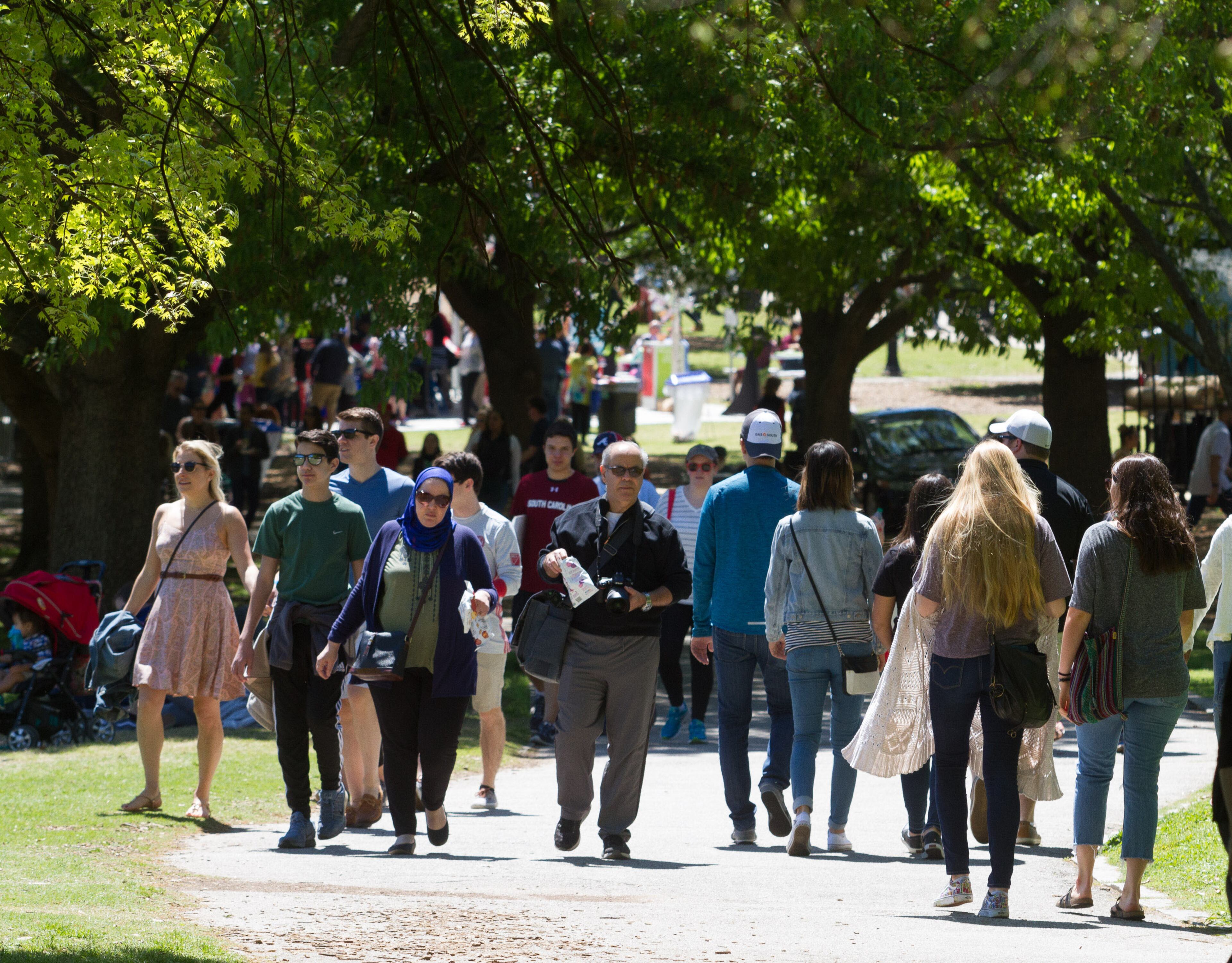 A large crowd fills the pathways and roads in Piedmont Park during the 81st Annual Atlanta Dogwood Festival Saturday in Atlanta, Ga April 8, 2017. STEVE SCHAEFER / SPECIAL TO THE AJC