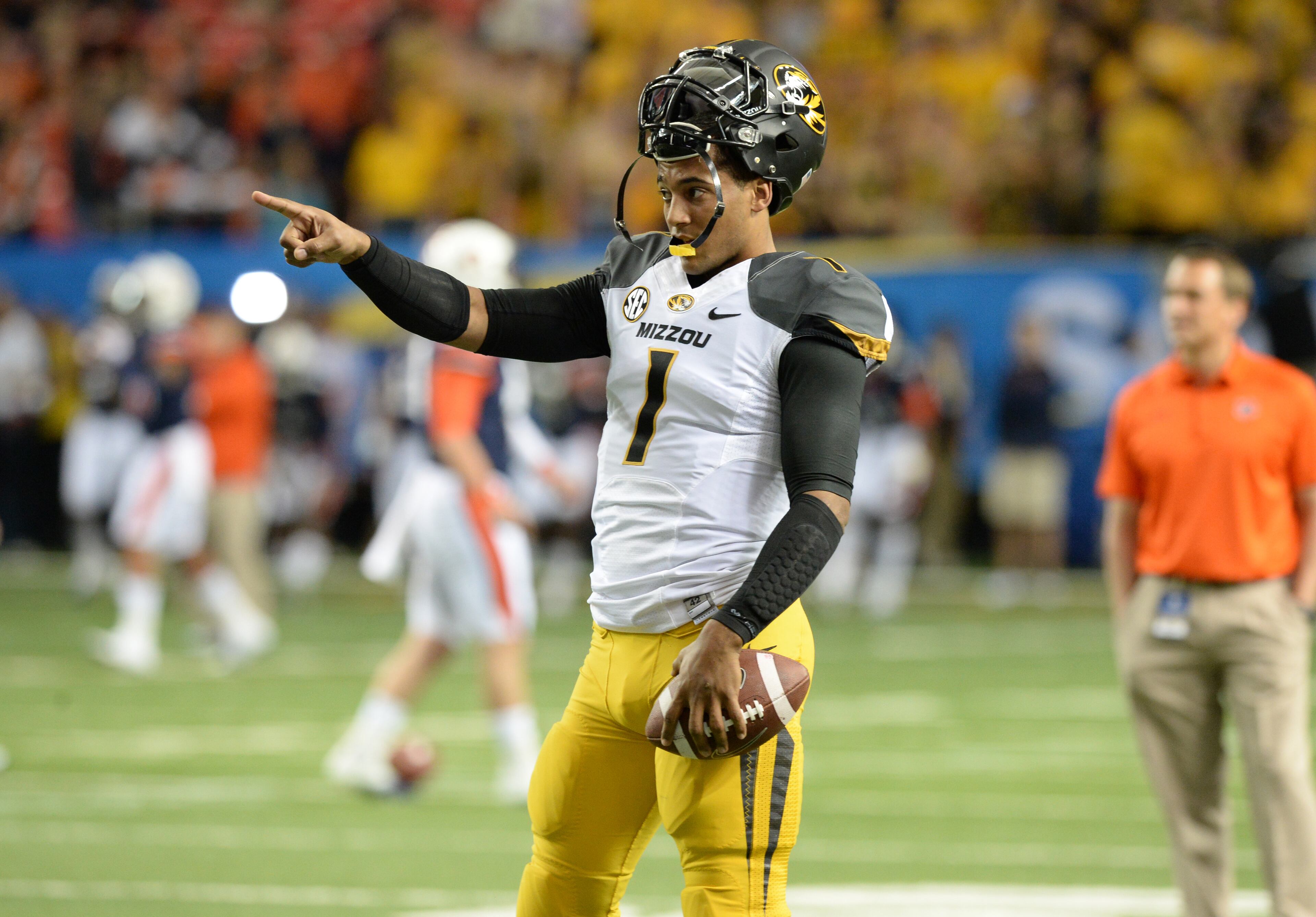 Missouri Tigers quarterback James Franklin (1) warms up before the SEC Championship game against the Auburn Tigers at Georgia Dome on Saturday, December 7, 2013.