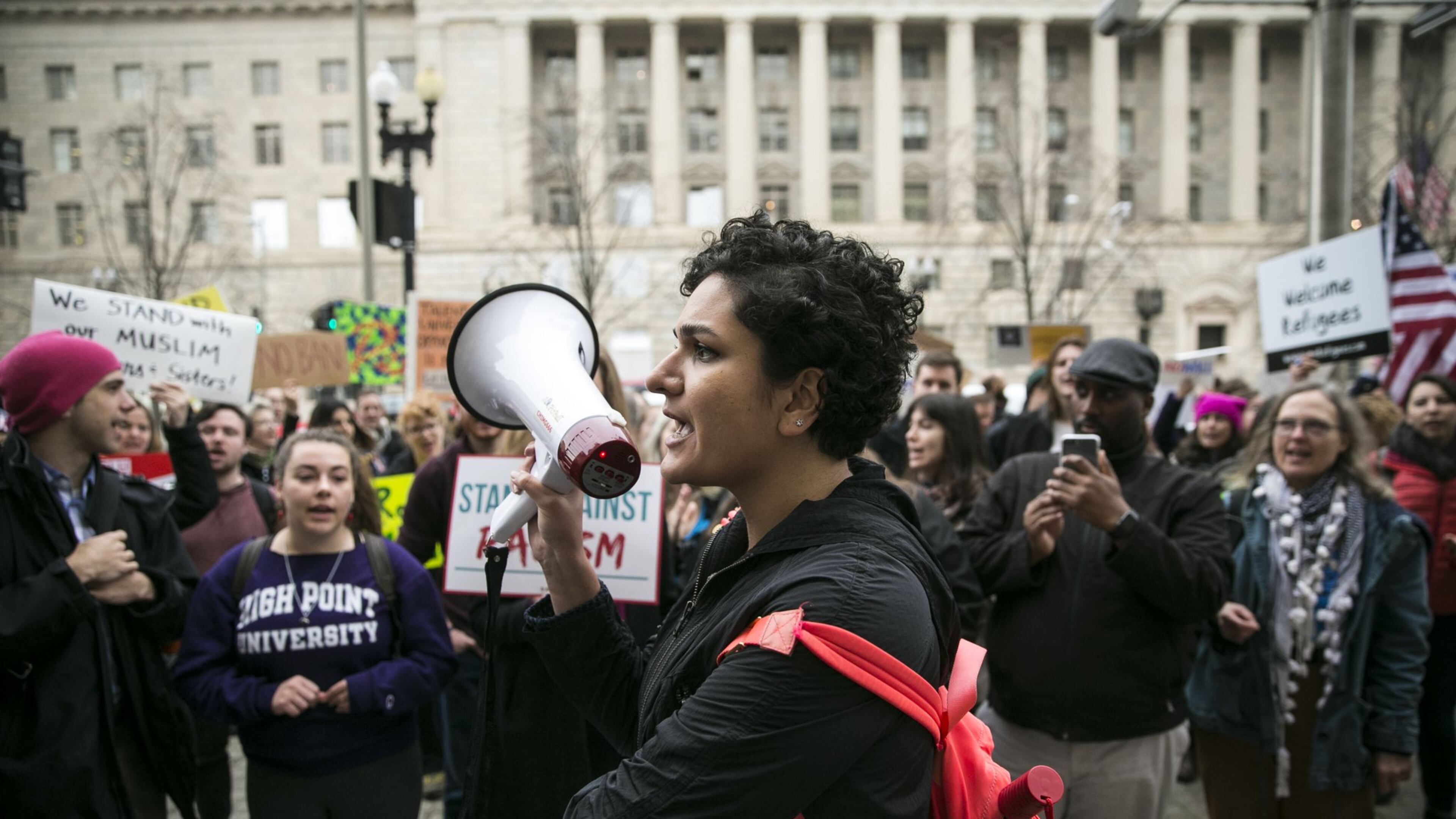 Protesters demonstrate against President Donald Trump’s revised travel ban outside the U.S. Customs and Border Protection headquarters in Washington, March 7, 2017. The new executive order removes citizens of Iraq from the original ban and scraps a provision that explicitly protected religious minorities. (Al Drago/The New York Times)