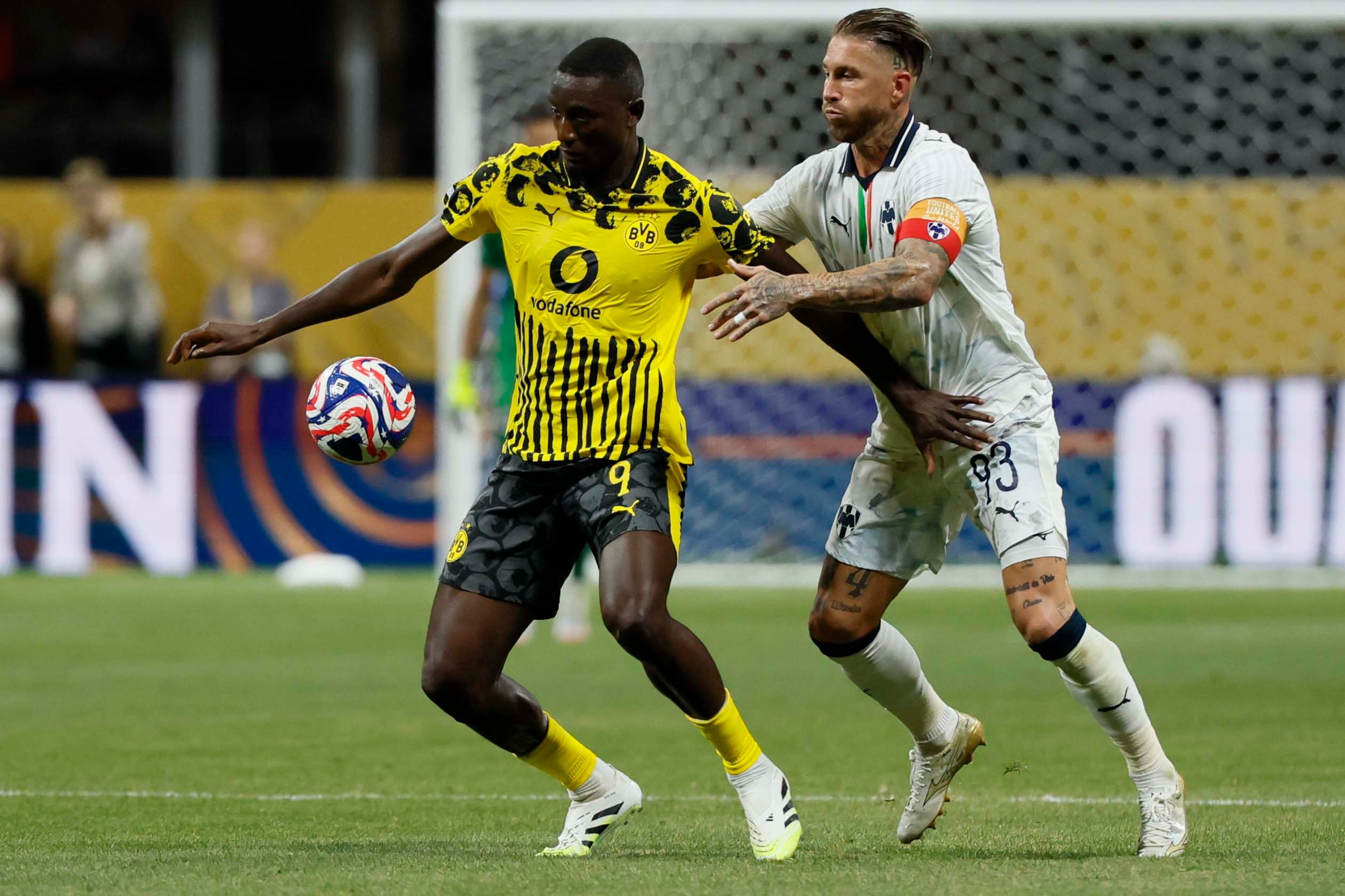 Borussia Dortmund forward Serhou Guirassy (9) battles for possession against Monterrey defender Sergio Ramos (93) during the Club World Cup round of 16 soccer match between Borussia Dortmund and C.F. Monterrey in Atlanta, Georgia, on Tuesday, July 1, 2025.
(Miguel Martinez/ AJC)