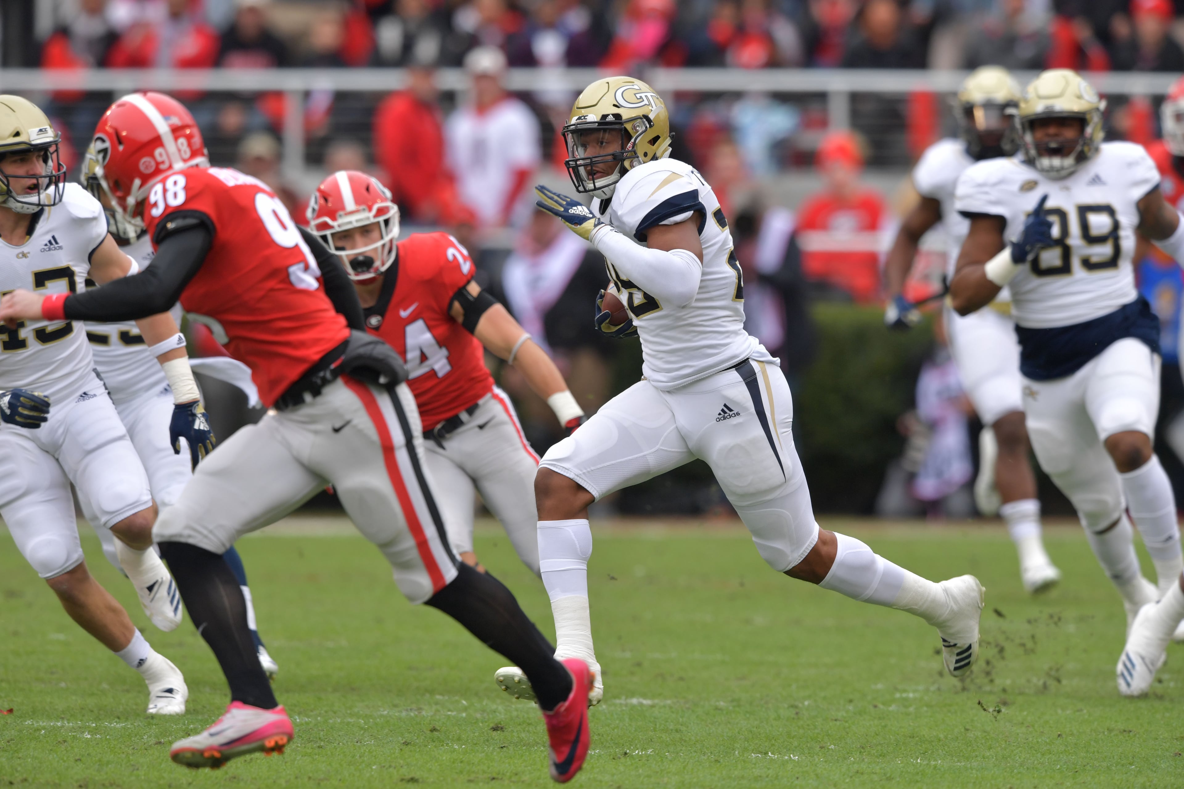 November 24, 2018 Athens - Georgia Tech defensive back Ajani Kerr (38) runs for one hundred yard touchdown during the first half in a NCAA college football game at Sanford Stadium on Saturday, November 24, 2018. HYOSUB SHIN / HSHIN@AJC.COM