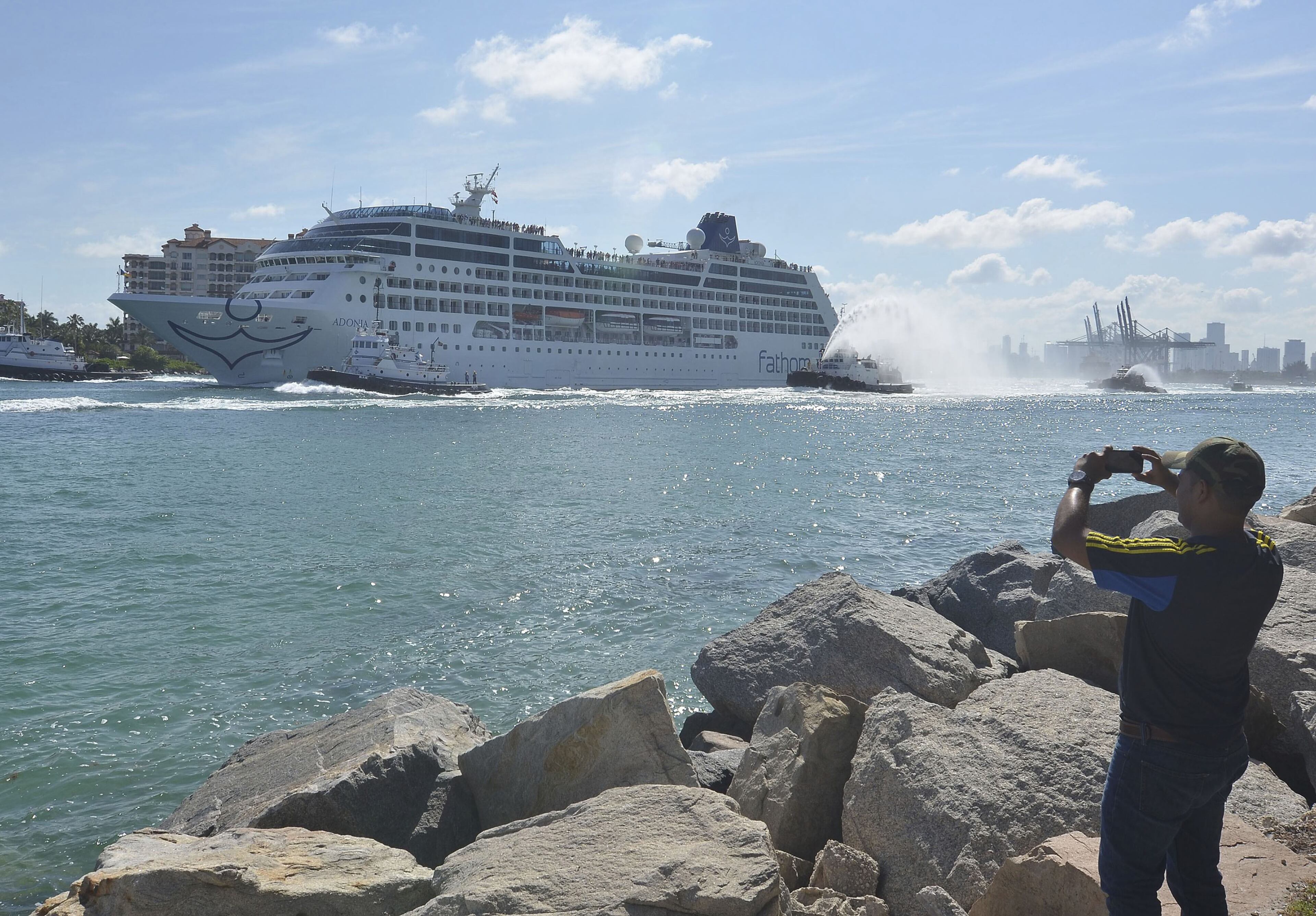 The cruise ship Adonia, from the new Carnival's Fathom line, sails Miami's port escorted by tugboats as it heads to Cuba on May 2, 2016 in Miami, Fla. Adonia, with a capacity of 704 passengers, is the first American cruise line to make a voyage to Cuba in about 50 years. (Gaston De Cardenas/EFE/Zuma Press/TNS)
