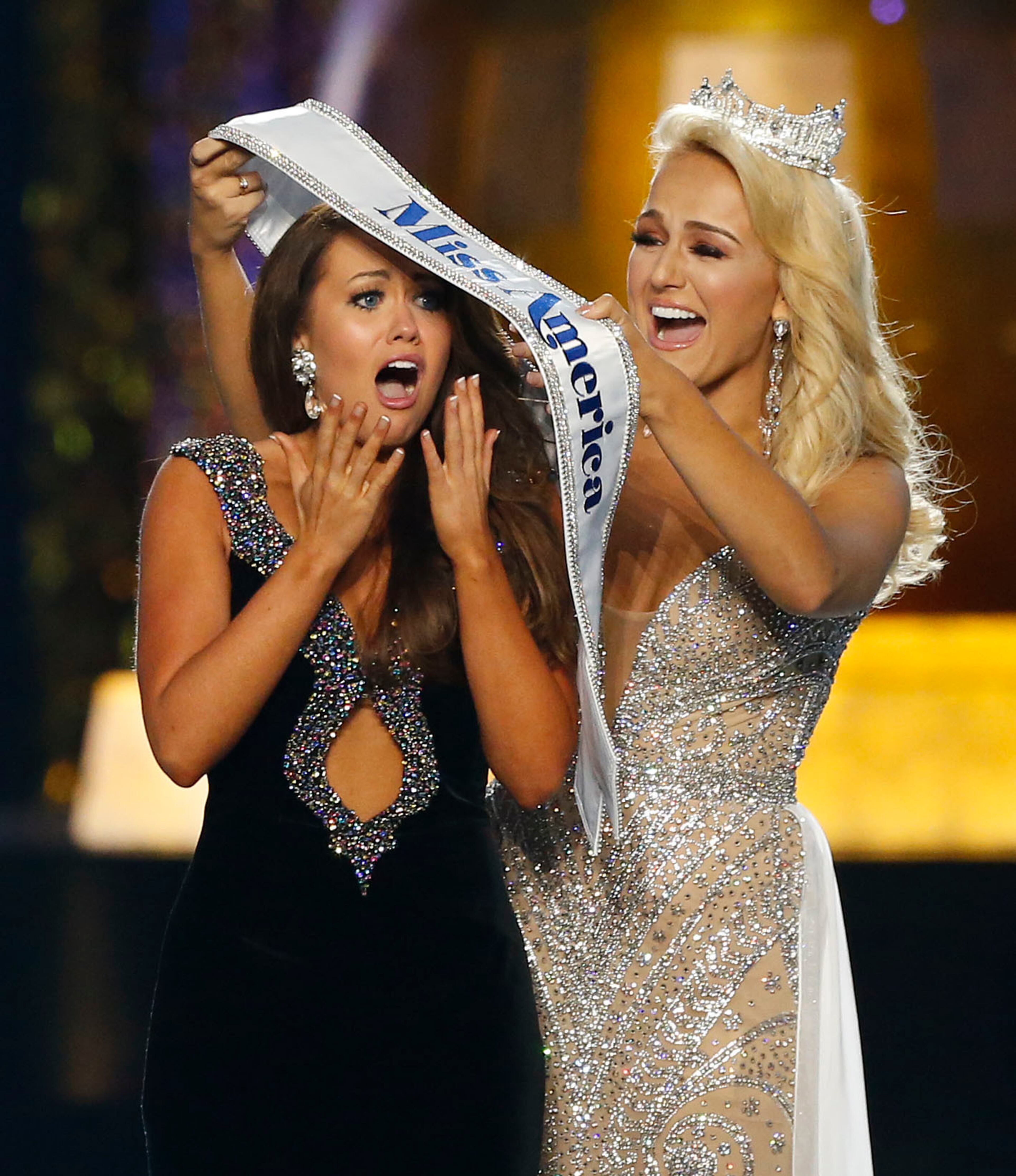 Miss North Dakota Cara Mund reacts after being named Miss America during Miss America 2018 pageant, Sunday, Sept. 10, 2017, in Atlantic City, N.J. (AP Photo/Noah K. Murray)