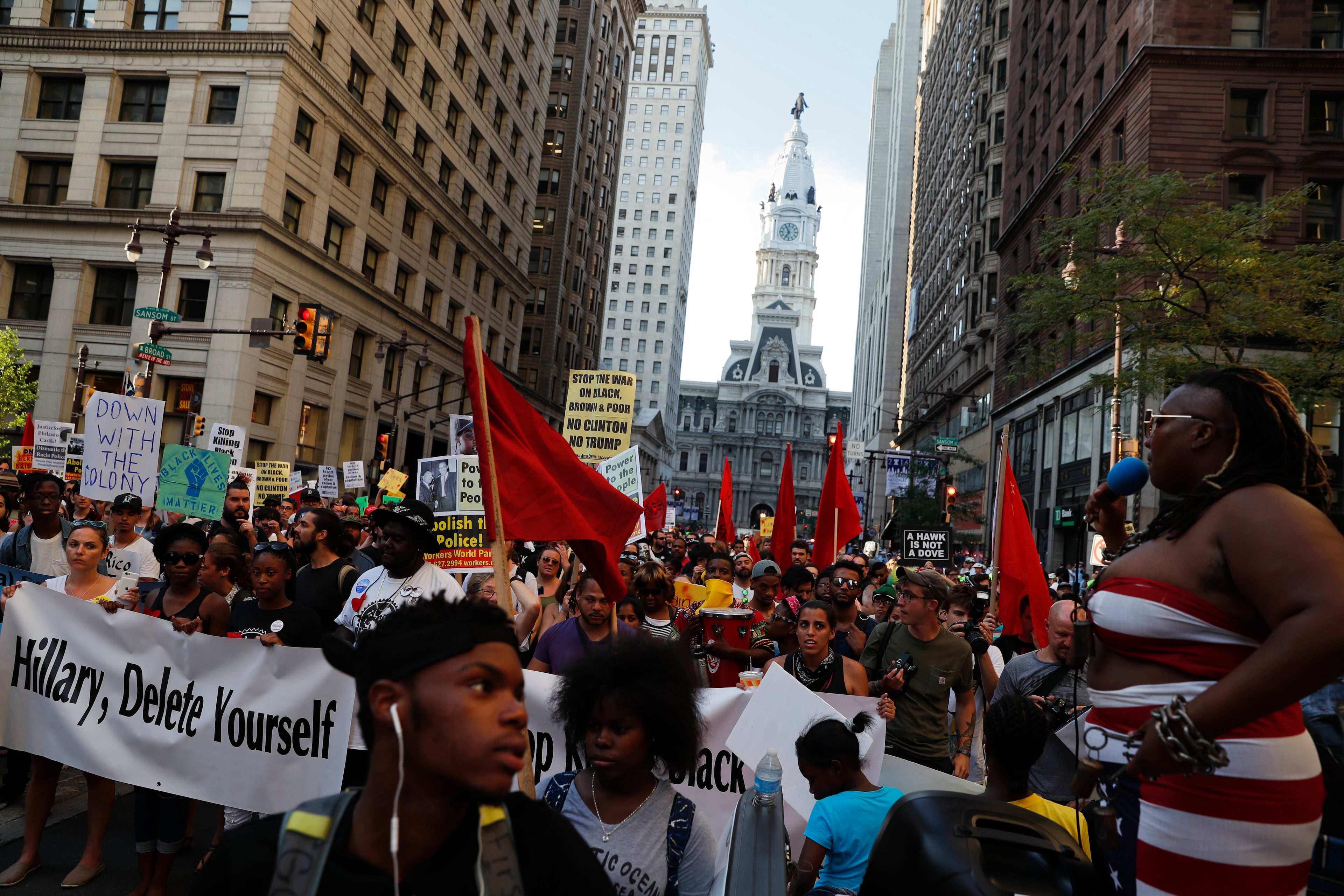 Demonstrators march in downtown Philadelphia, Tuesday, July 26, 2016, during the second day of the Democratic National Convention. (AP Photo/John Minchillo)