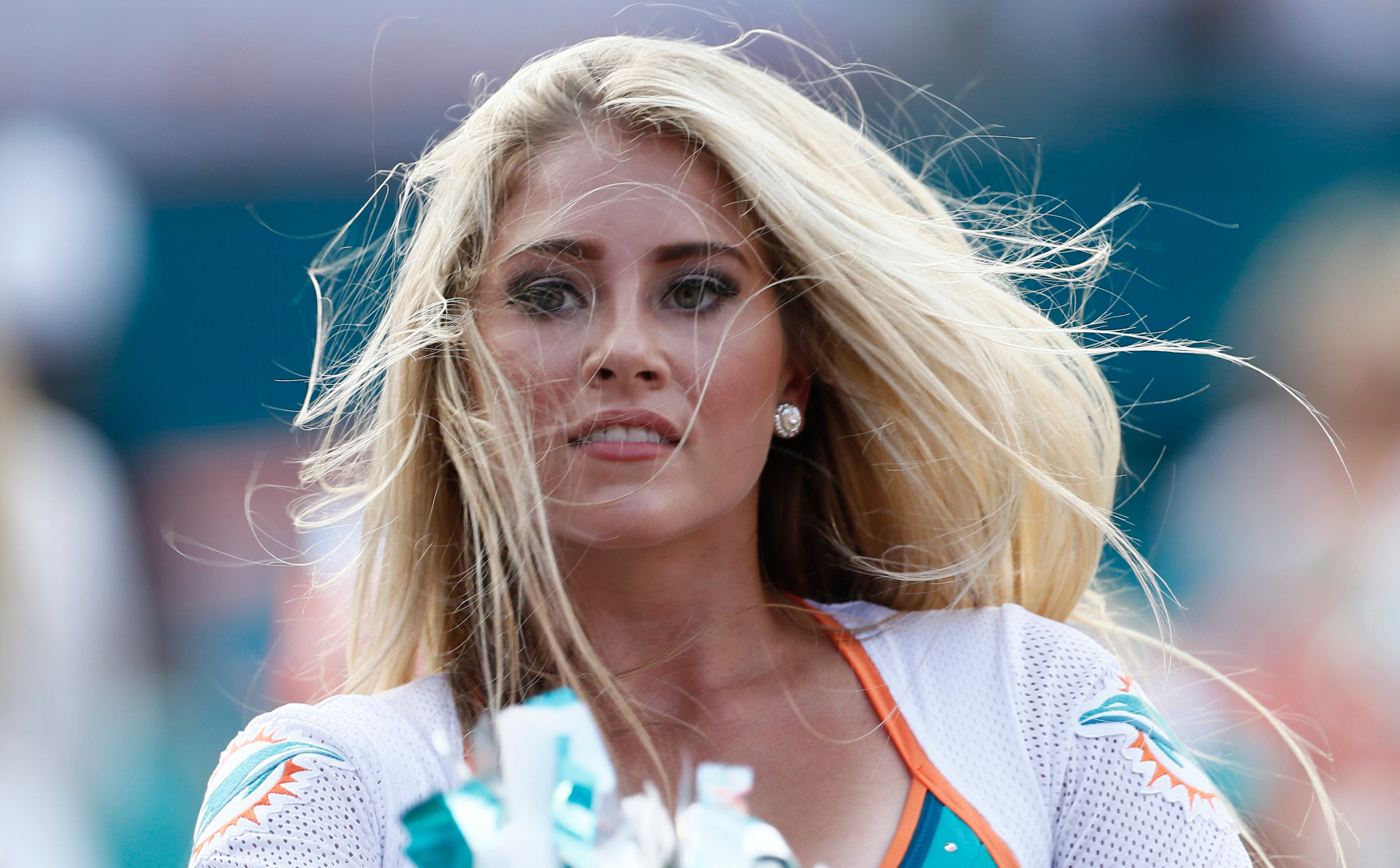A Miami Dolphins cheerleader performs.
