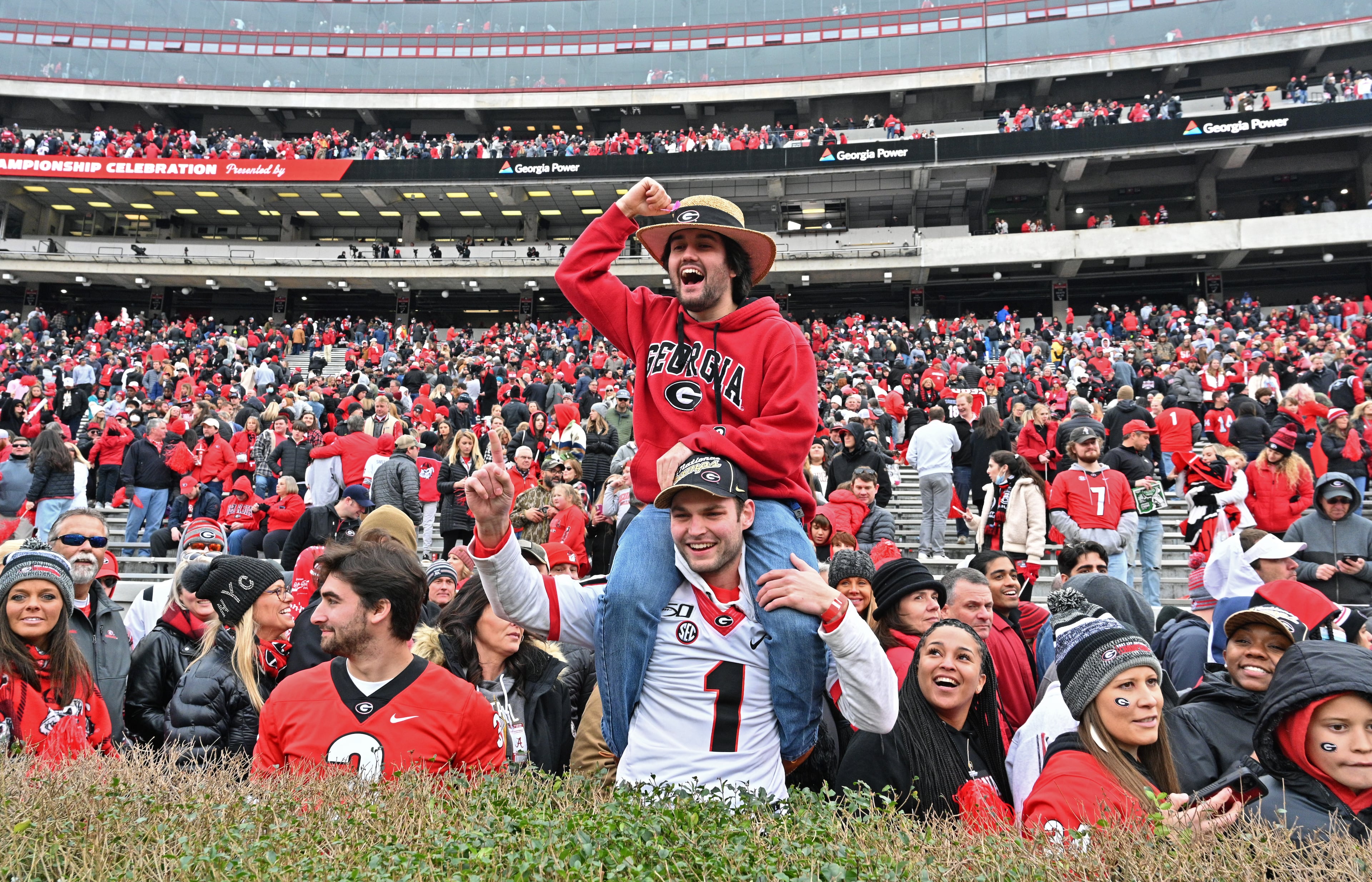 January 15, 2022 Athens - Georgia fans cheer during the celebration of Georgia’s College Football Playoff national championship at Sanford Stadium in Athens on Saturday, January 15, 2022. Georgia captured the national championship, its first since the 1980 season, with a 33-18 victory over Alabama at Lucas Oil Stadium in Indianapolis. (Hyosub Shin / Hyosub.Shin@ajc.com)