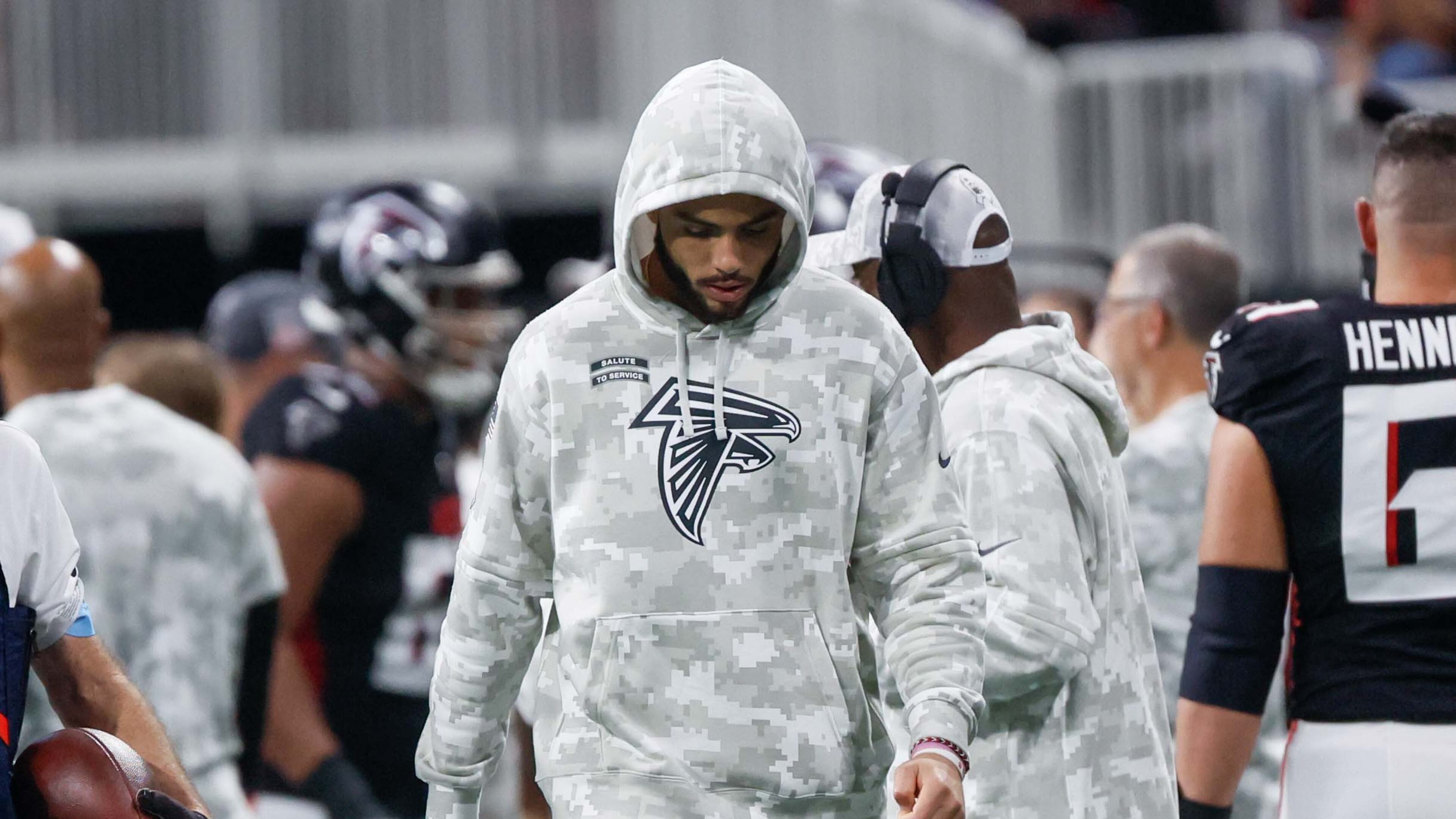 Atlanta Falcons wide receiver Drake London (5) is seen walking with his head down on the sidelines during the second half on Sunday, November 3, 2024, at Mercedes-Benz Stadium in Atlanta. London left the field and was seen without a uniform on the sidelines.
(Miguel Martinez/ AJC)