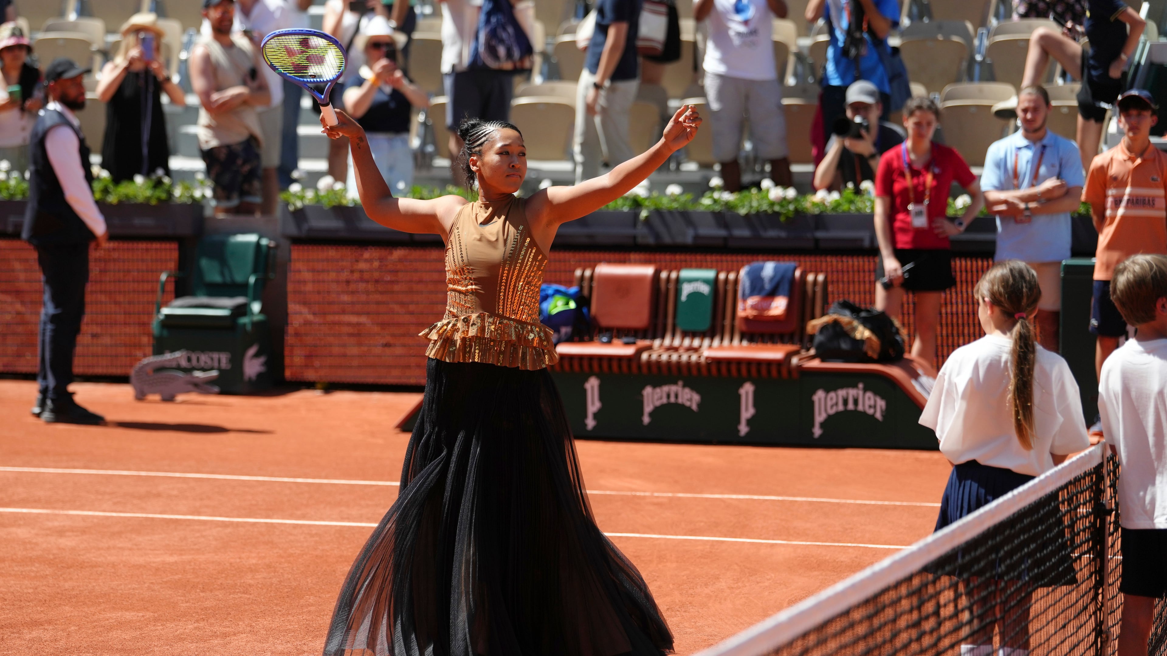 Naomi Osaka of Japan gestures before the first round women's singles tennis match against Laura Siegemund of Germany at the French Open tennis tournament in Paris, Tuesday, May 26, 2026. (AP Photo/Aurelien Morissard)