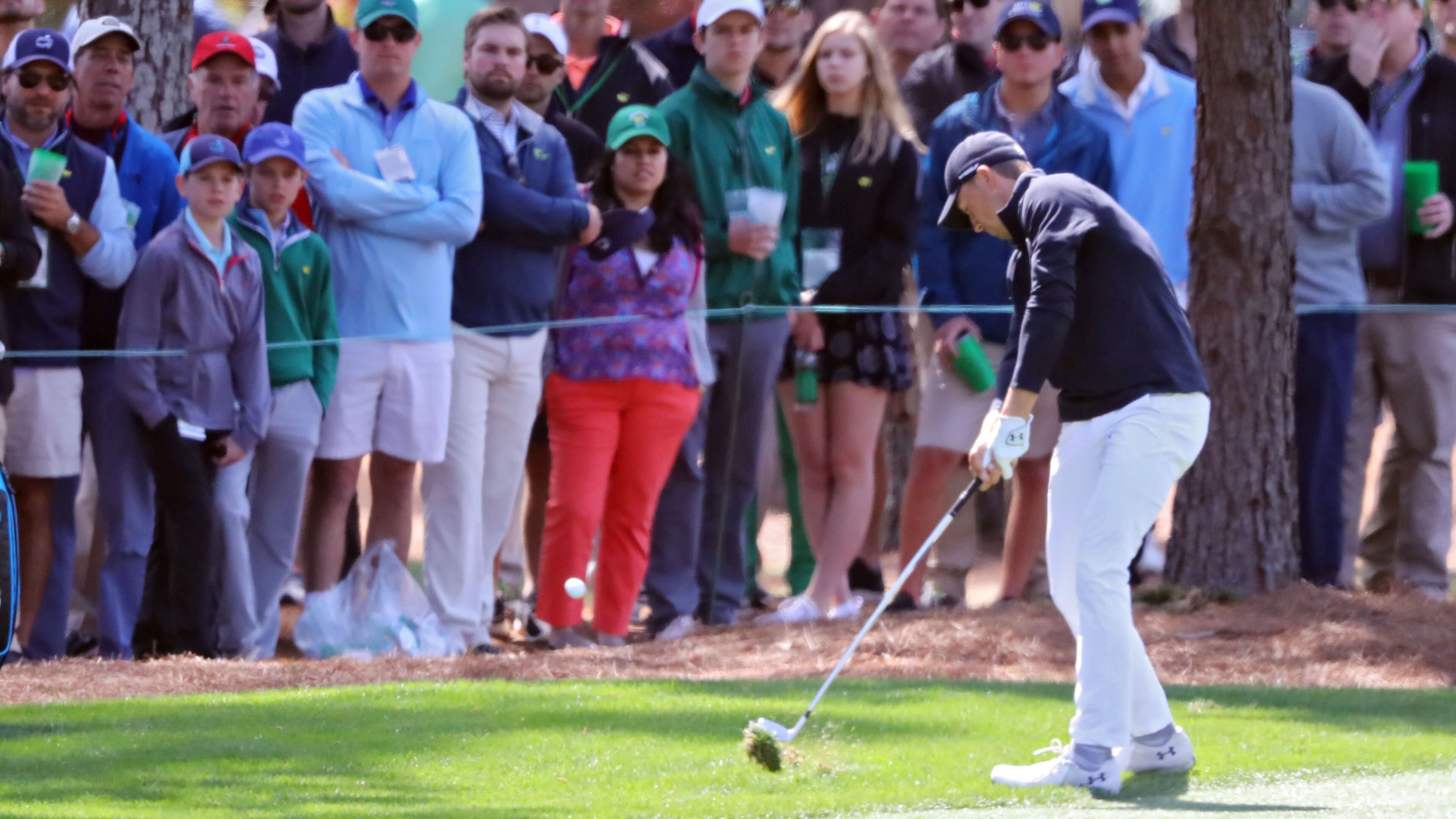 Jordan Spieth hits his fairway shot on seven during the final round of the Masters Tournament Sunday, April 8, 2018, at Augusta National Golf Club.