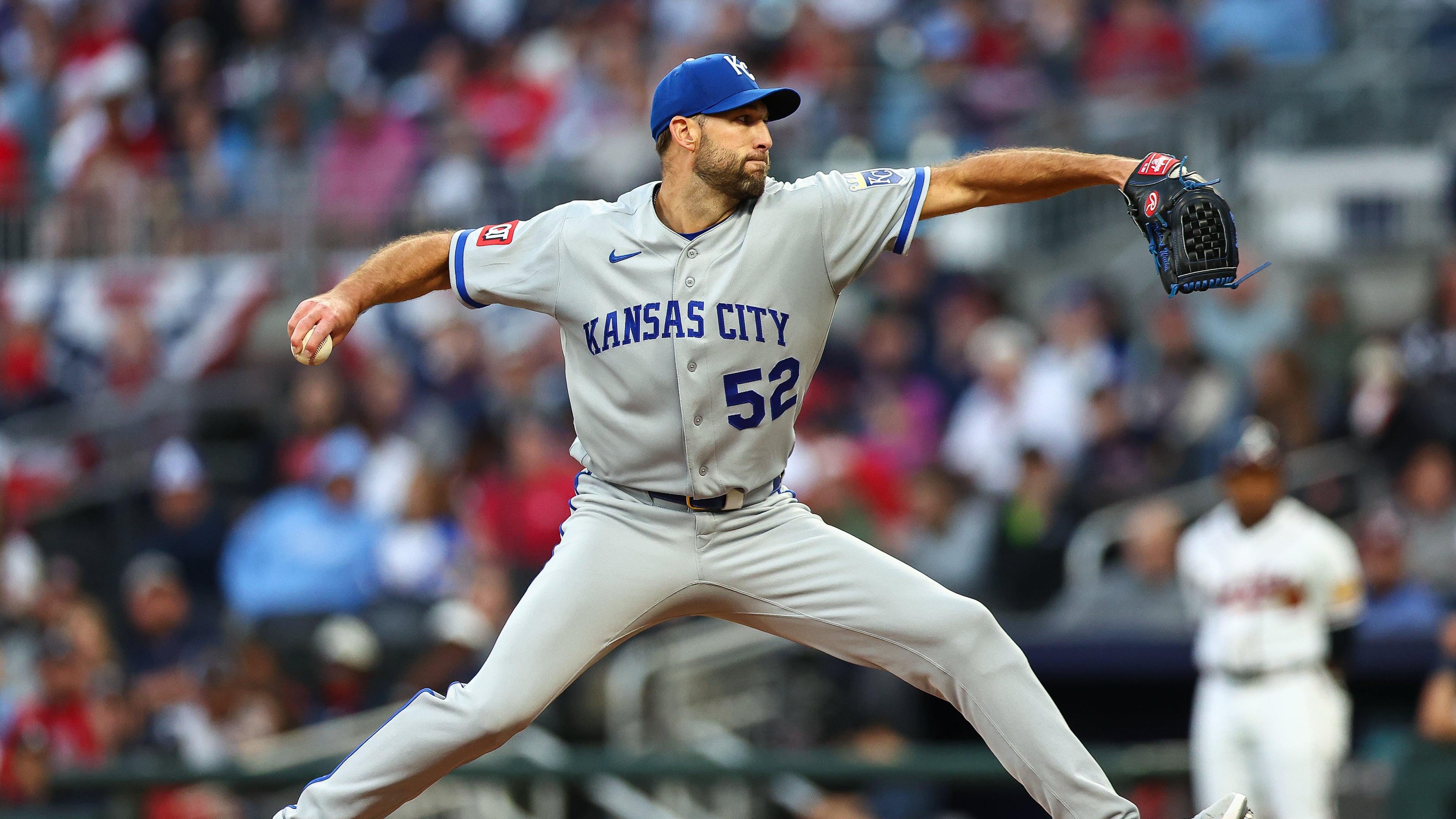 Kansas City Royals pitcher Michael Wacha (52) delivers in the first inning of a baseball game against the Atlanta Braves, Saturday, March 28, 2026, in Atlanta. (AP Photo/Colin Hubbard)