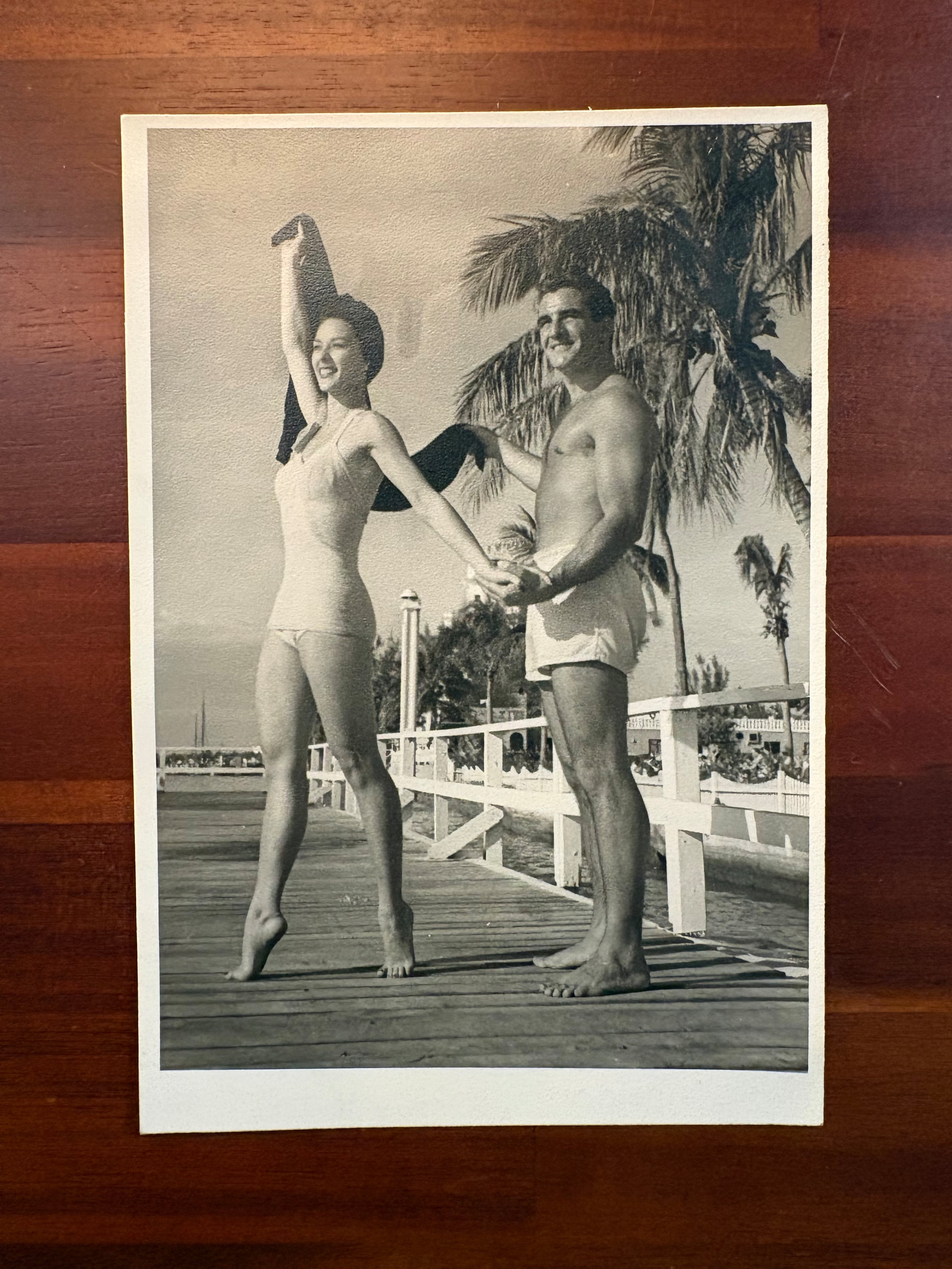 Lou Junod walks along the boardwalk in Miami with an unidentified woman. “He was a man who considered himself a man’s man,” Tom Junod says. (Courtesy of Doubleday)