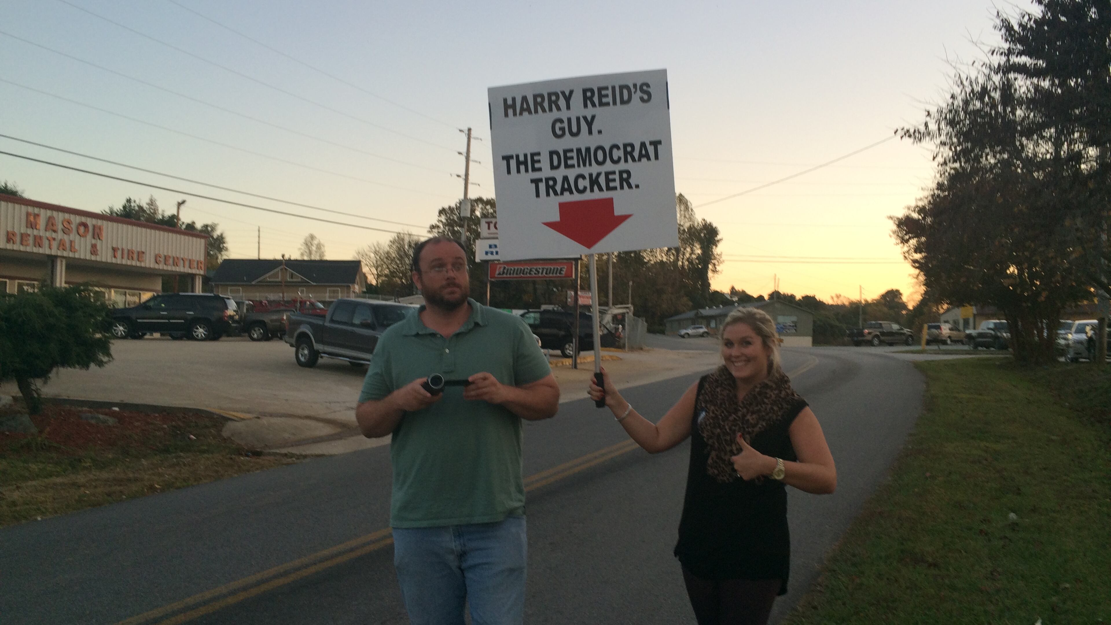 Staffers for Republican U.S. Senate candidate David Perdue like to call attention to trackers.