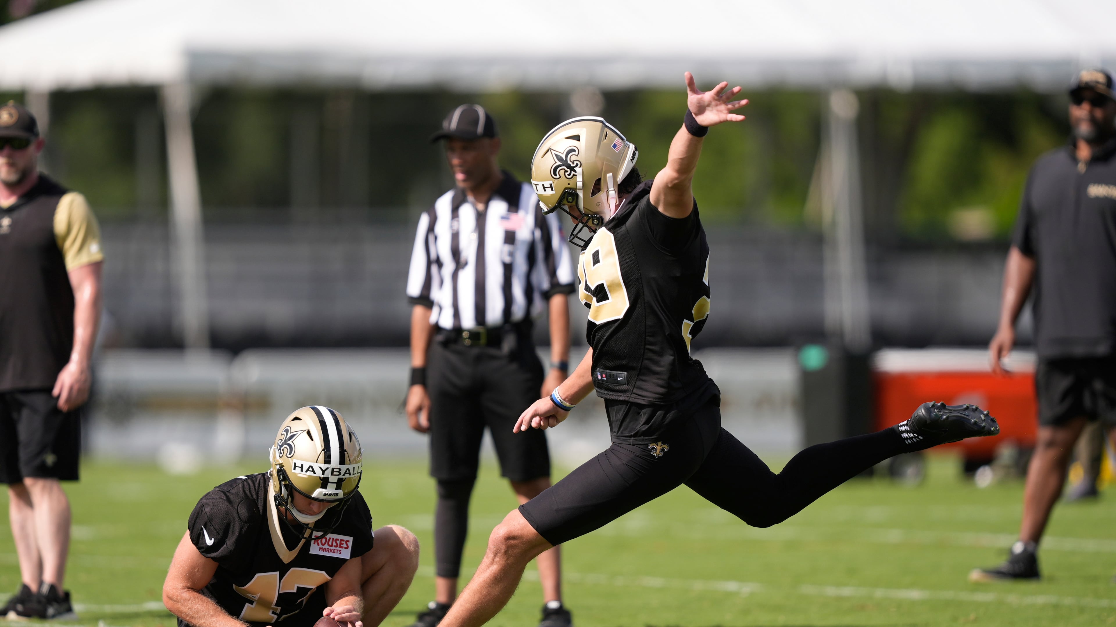 New Orleans Saints place kicker Charlie Smyth and holder Matthew Hayball go through drills during Back Together Weekend at the team's NFL football training camp in Metairie, La., Sunday, July 27, 2025. (Gerald Herbert/AP)