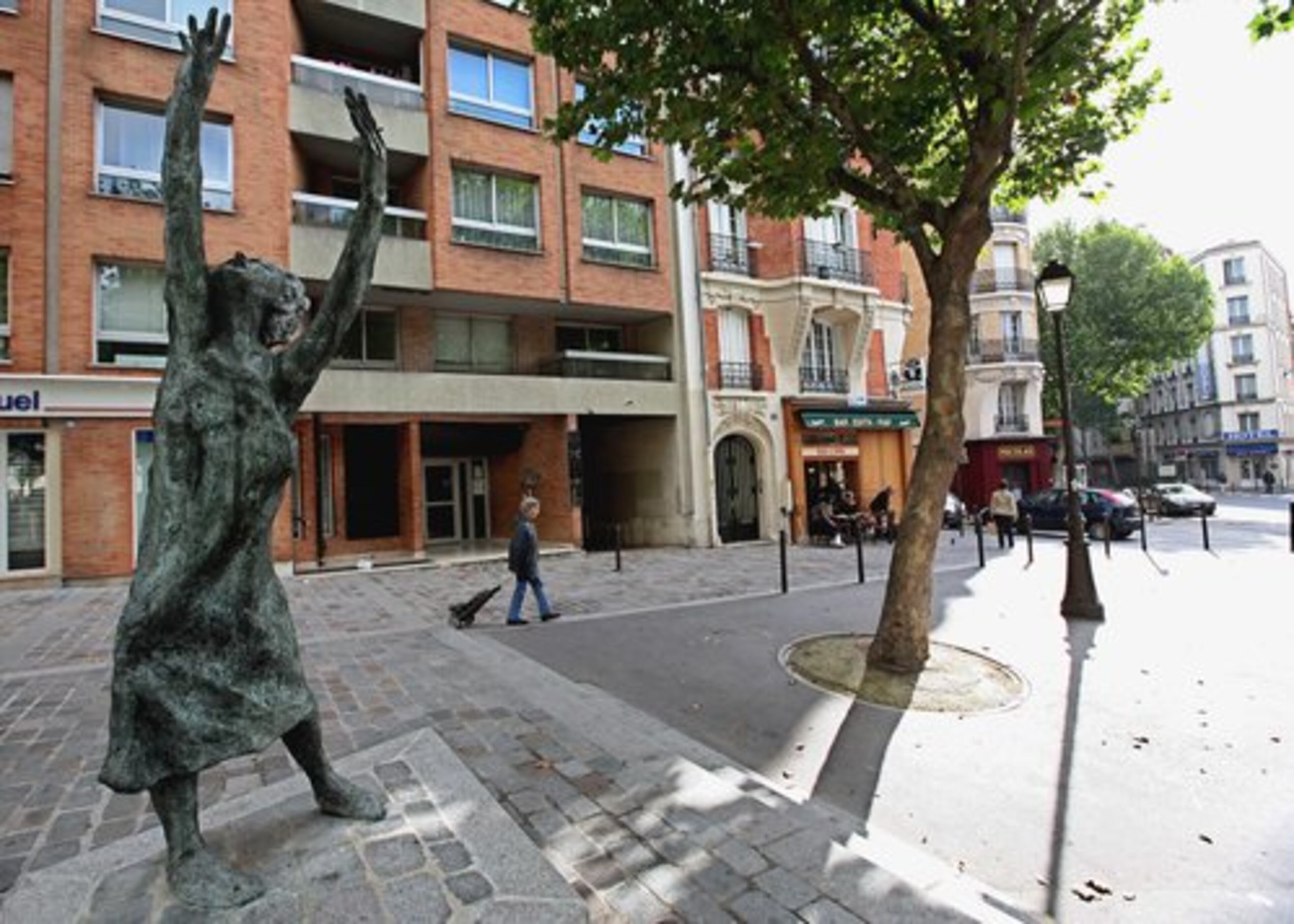 A STATUE of Edith Piaf pays homage to the French singer in Belleville, the Paris neighborhood where she once lived. Belleville is an often overlooked area of Paris, but it maintains its unique, if gritty, identity.