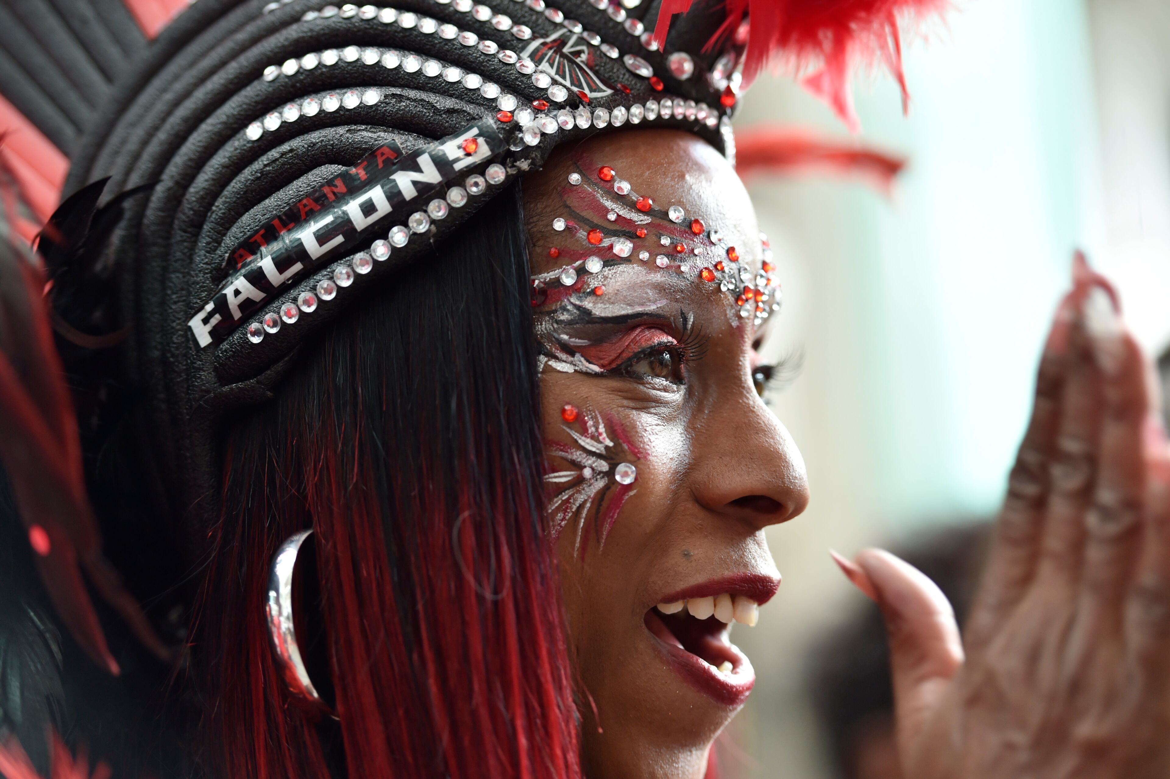 January 20, 2017, Atlanta - Keisha Burns, the "official bird lady", cheers during a pep rally for the upcoming NFC Championship game against the Packers in Atlanta, Georgia, on Friday, January 20, 2017. (DAVID BARNES / DAVID.BARNES@AJC.COM)