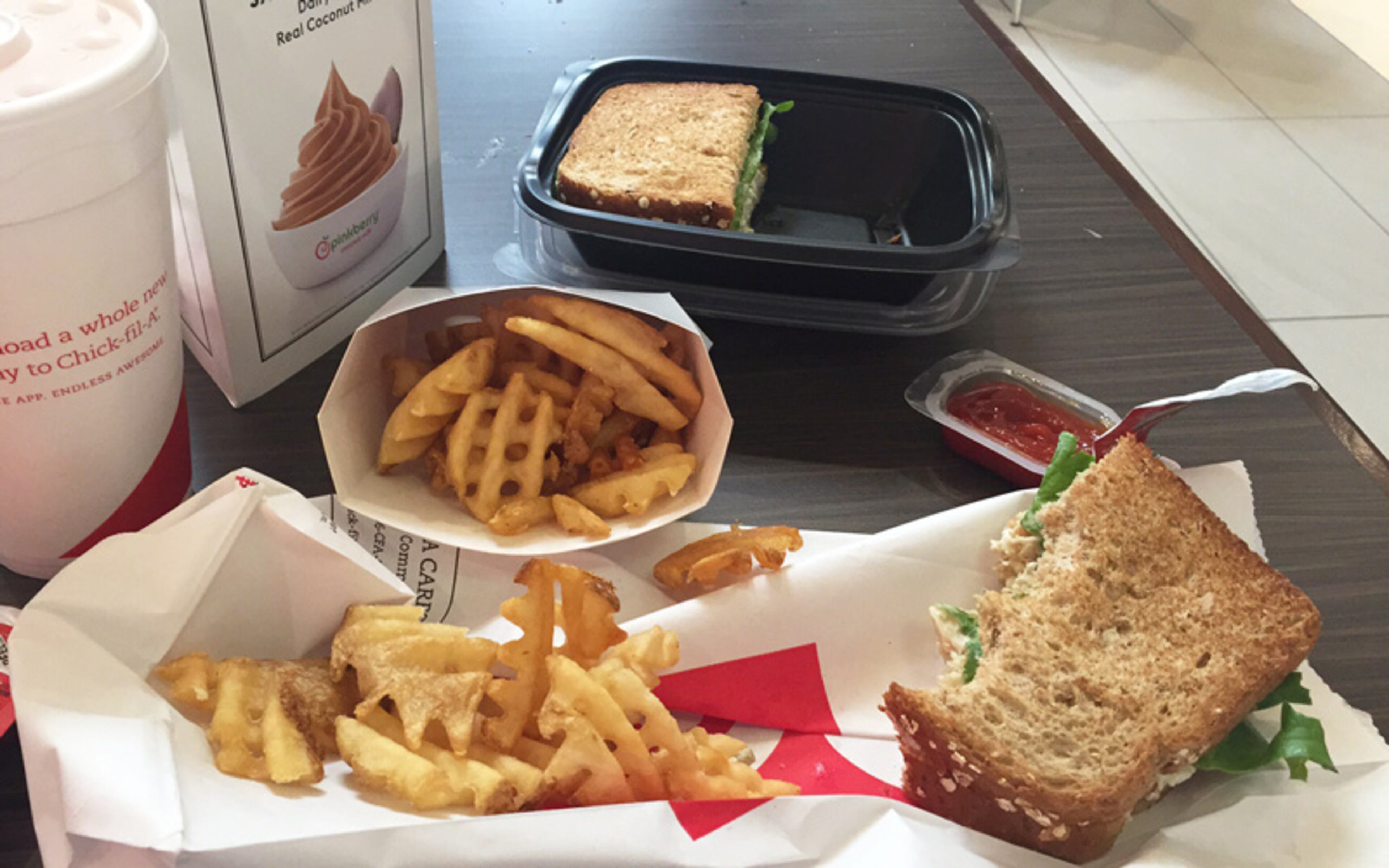 Chick-fil-A is one restaurant that accepts Apple Pay. You can buy a chicken salad sandwich, waffle fries and a lemonade with your phone if you forget your walled the way writer Omar L. Gallaga did.