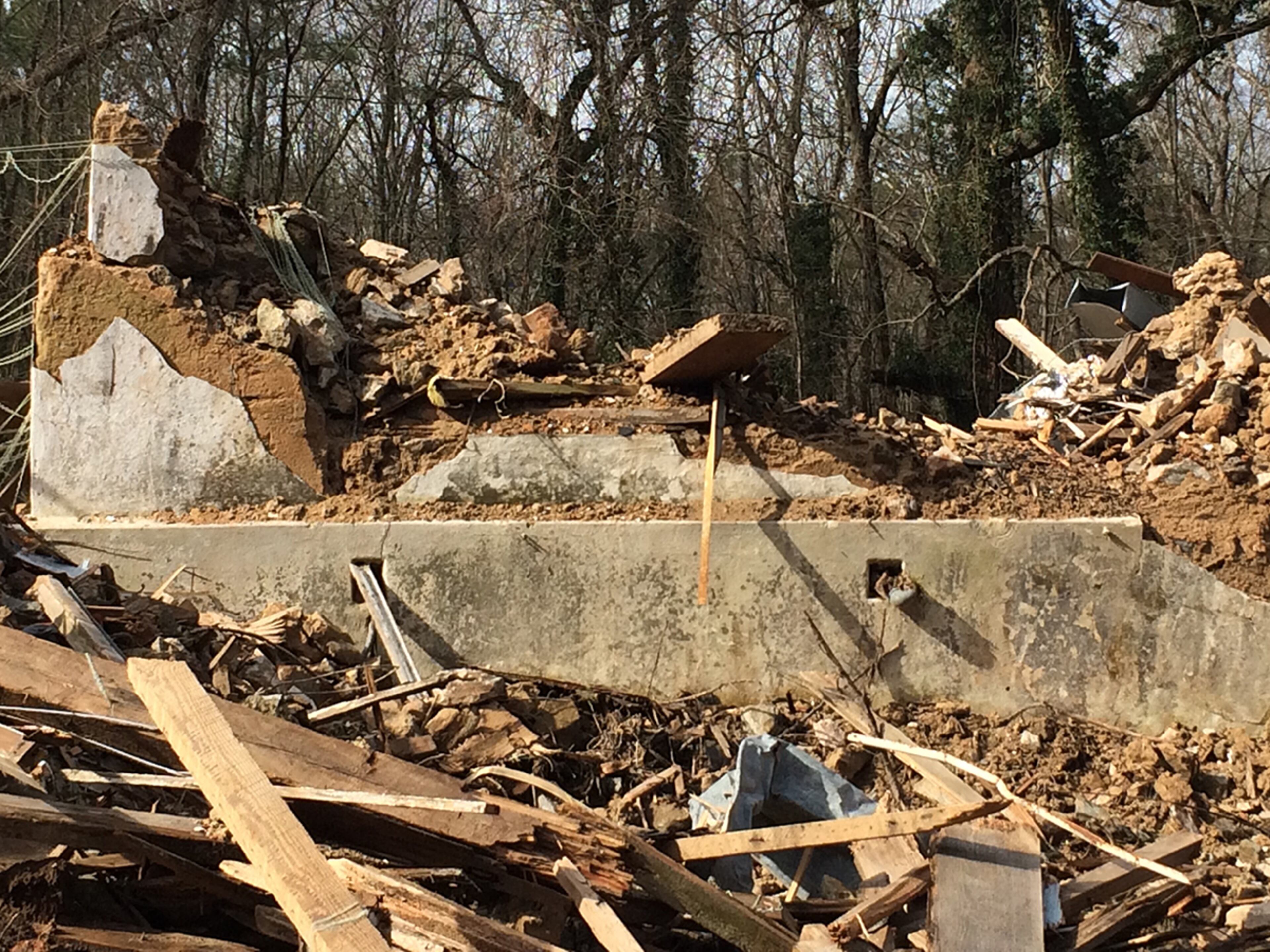 This is what the home looks like now, just a pile of rubble. The house had been listed on the National Register of Historic Places, but that recognition offered it no protection from local demolition laws. (MARK DAVIS / mdavis@ajc.com)