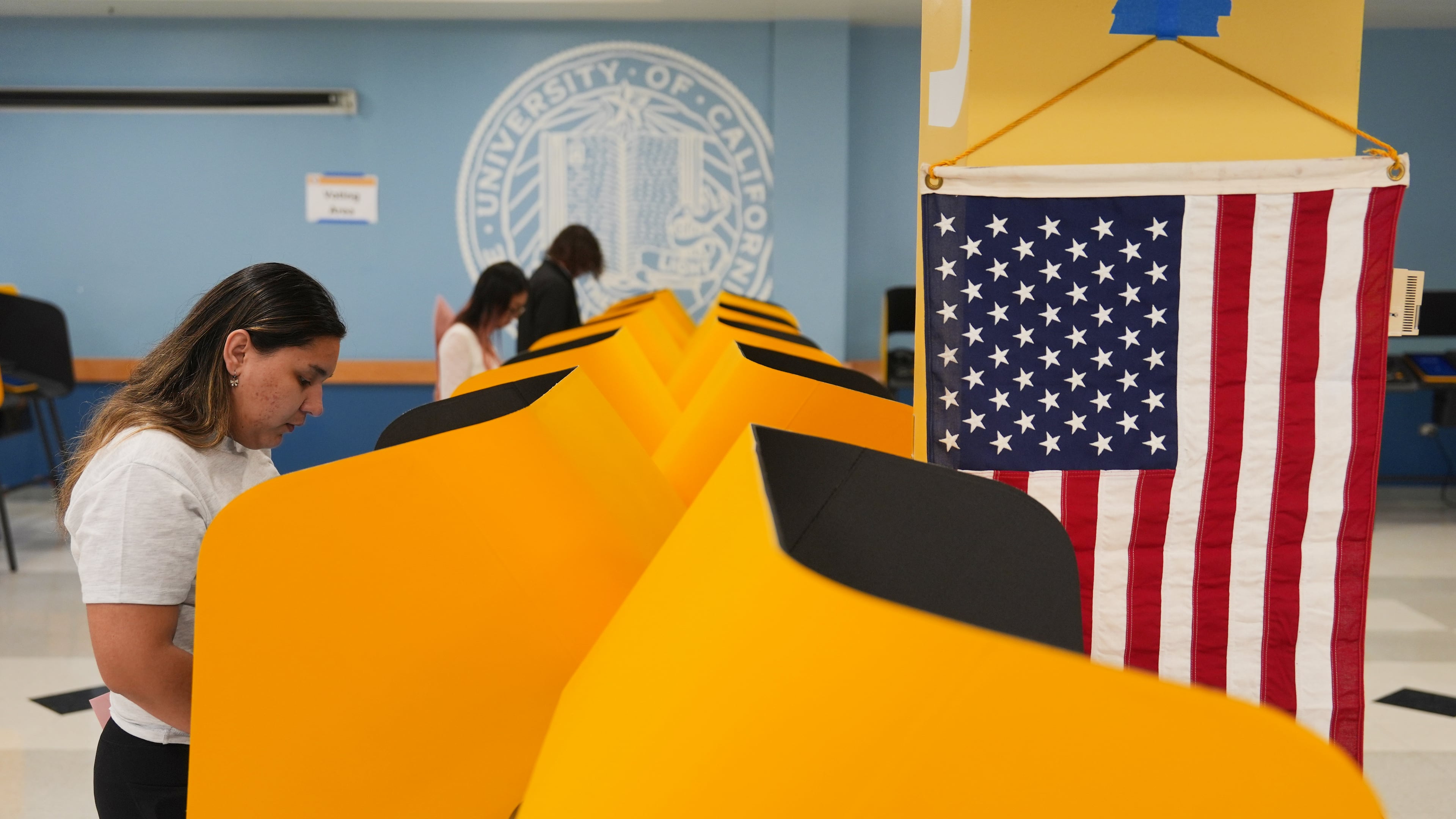 FILE - Voters cast their ballots at a voting center on the UCLA campus, June 2, 2026, in Los Angeles. (AP Photo/Jae C. Hong, File)